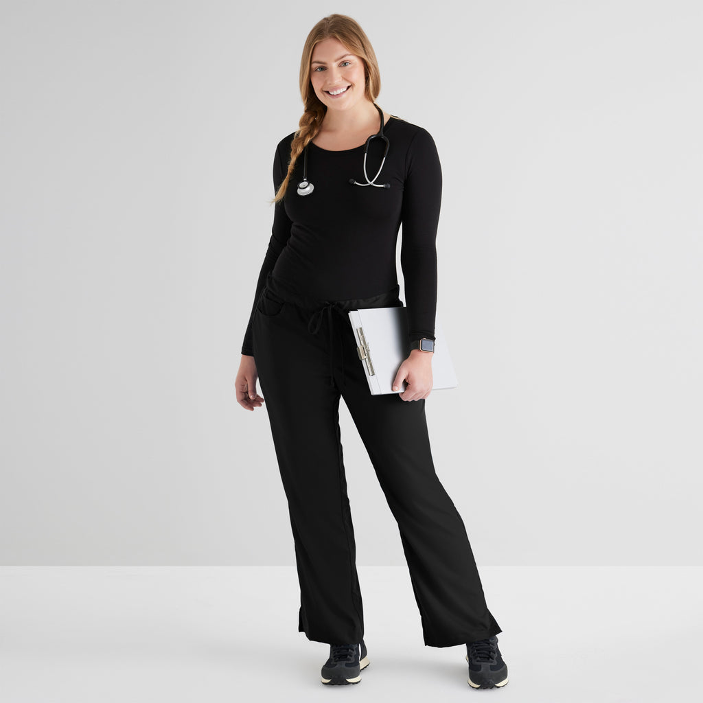 Grey's Anatomy Black Classic Riley Pant — 5 Pocket Scrub Pants. Flare leg. Mid rise. Drawcord waist with elastic back. 