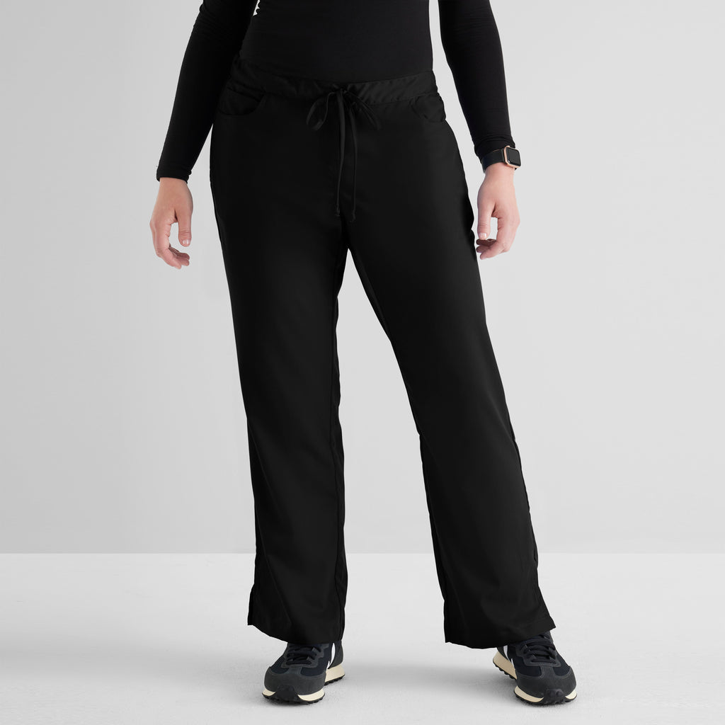 Grey's Anatomy Black Classic Riley Pant — 5 Pocket Scrub Pants. Flare leg. Mid rise. Drawcord waist with elastic back. 