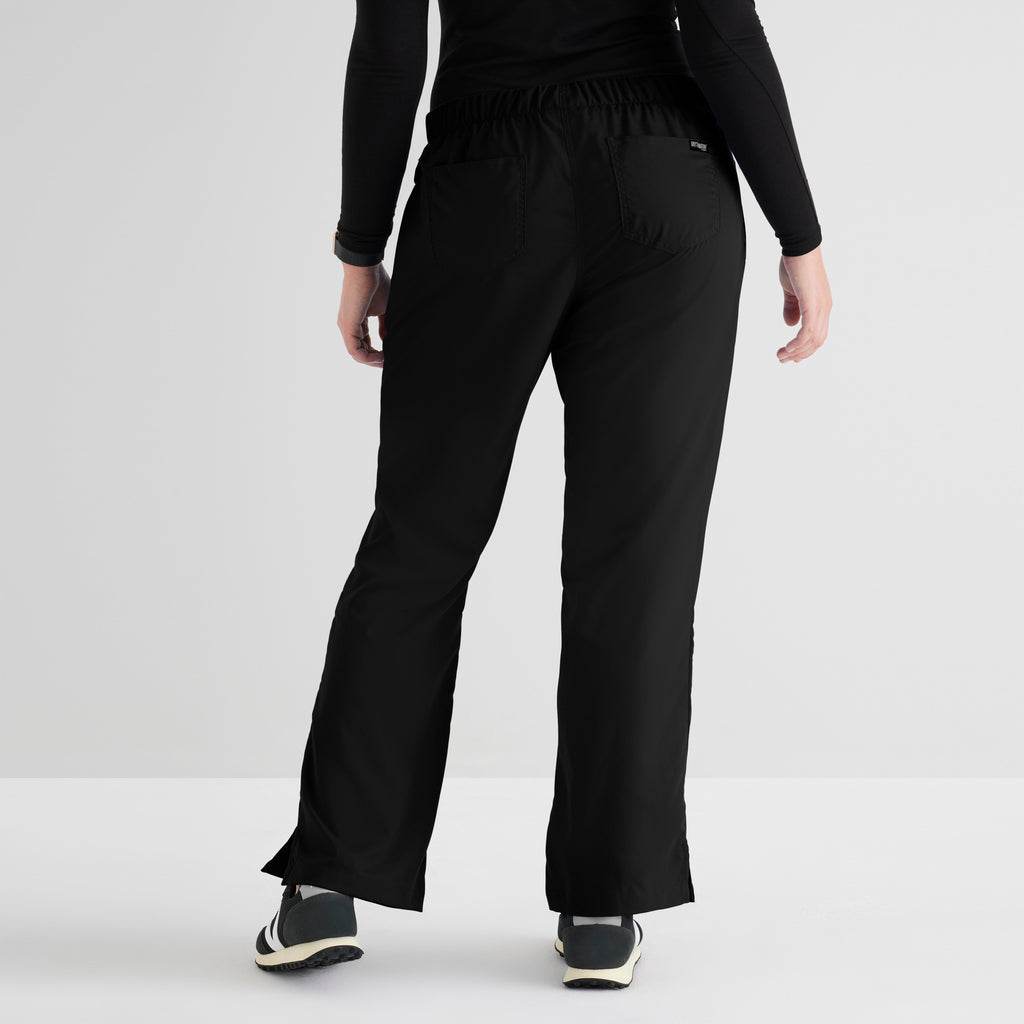 Grey's Anatomy Black Classic Riley Pant — 5 Pocket Scrub Pants. Flare leg. Mid rise. Drawcord waist with elastic back. 