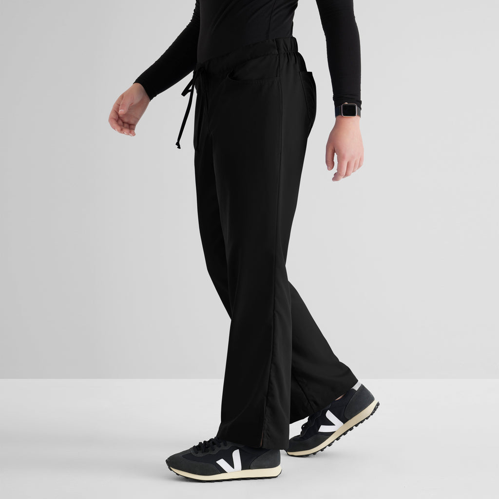 Grey's Anatomy Black Classic Riley Pant — 5 Pocket Scrub Pants. Flare leg. Mid rise. Drawcord waist with elastic back. 