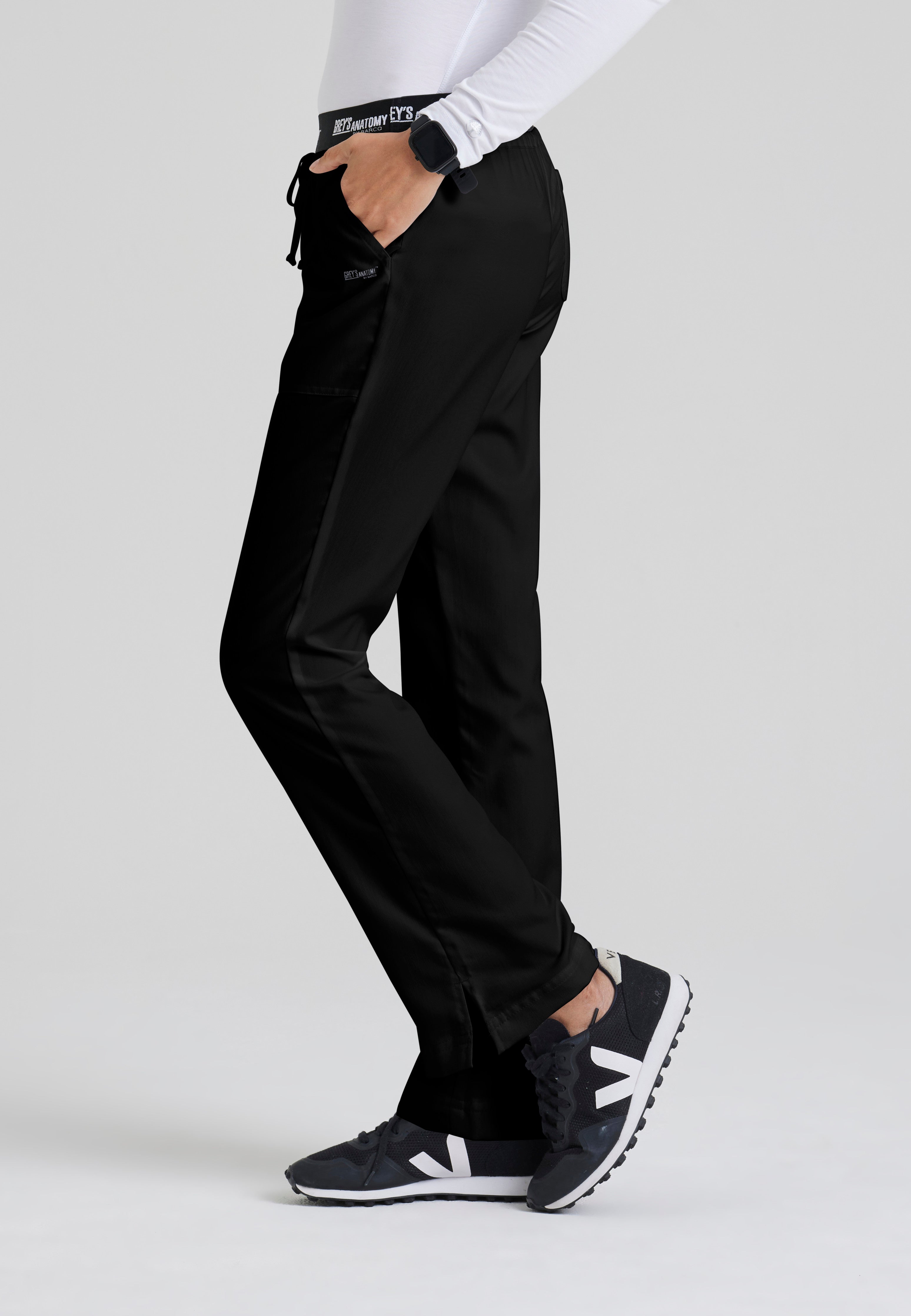 Side View of the Aubrey 3-Pocket Low-Rise Flared Leg Scrub Pant in Black from Grey's Anatomy™ by Barco Classic