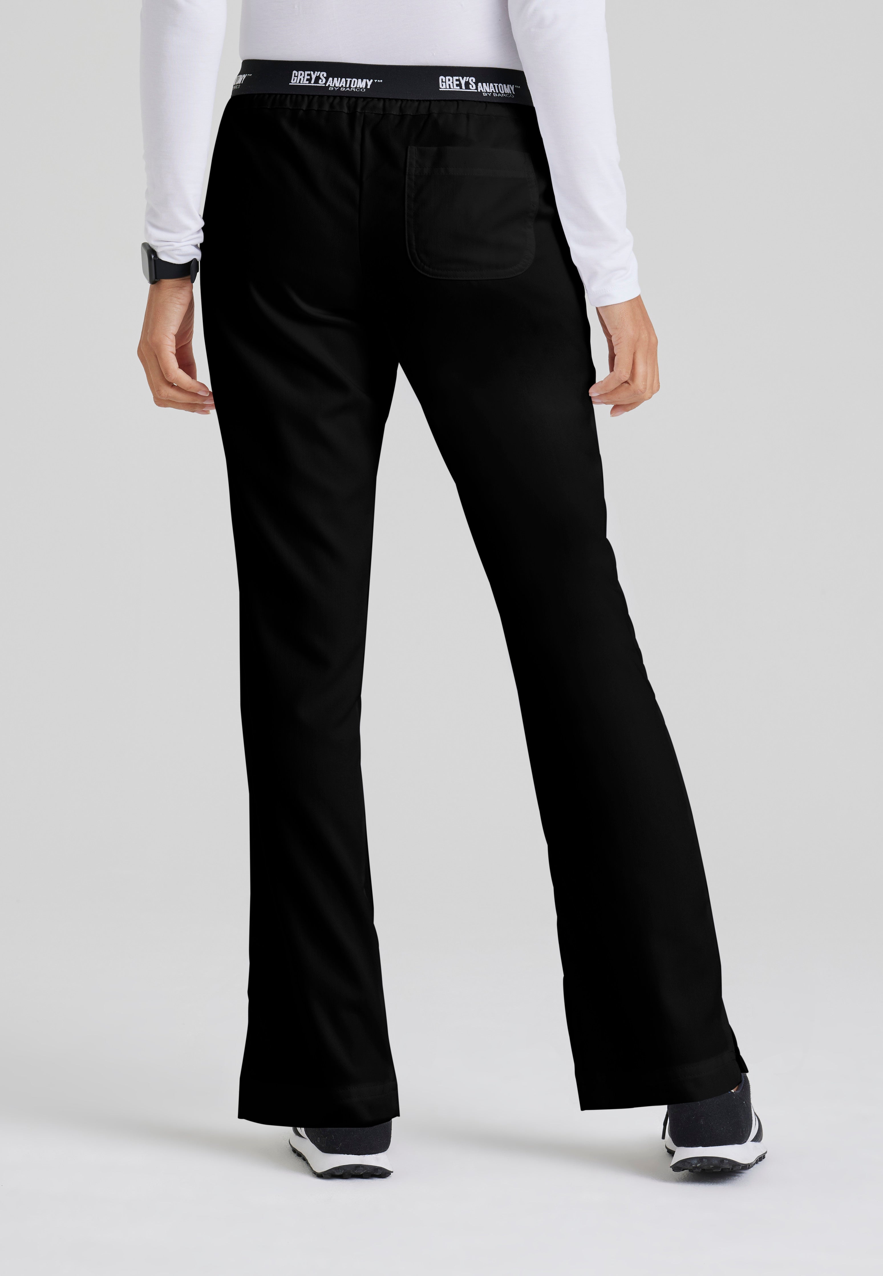 Back View of the Aubrey 3-Pocket Low-Rise Flared Leg Scrub Pant in Black from Grey's Anatomy™ by Barco Classic