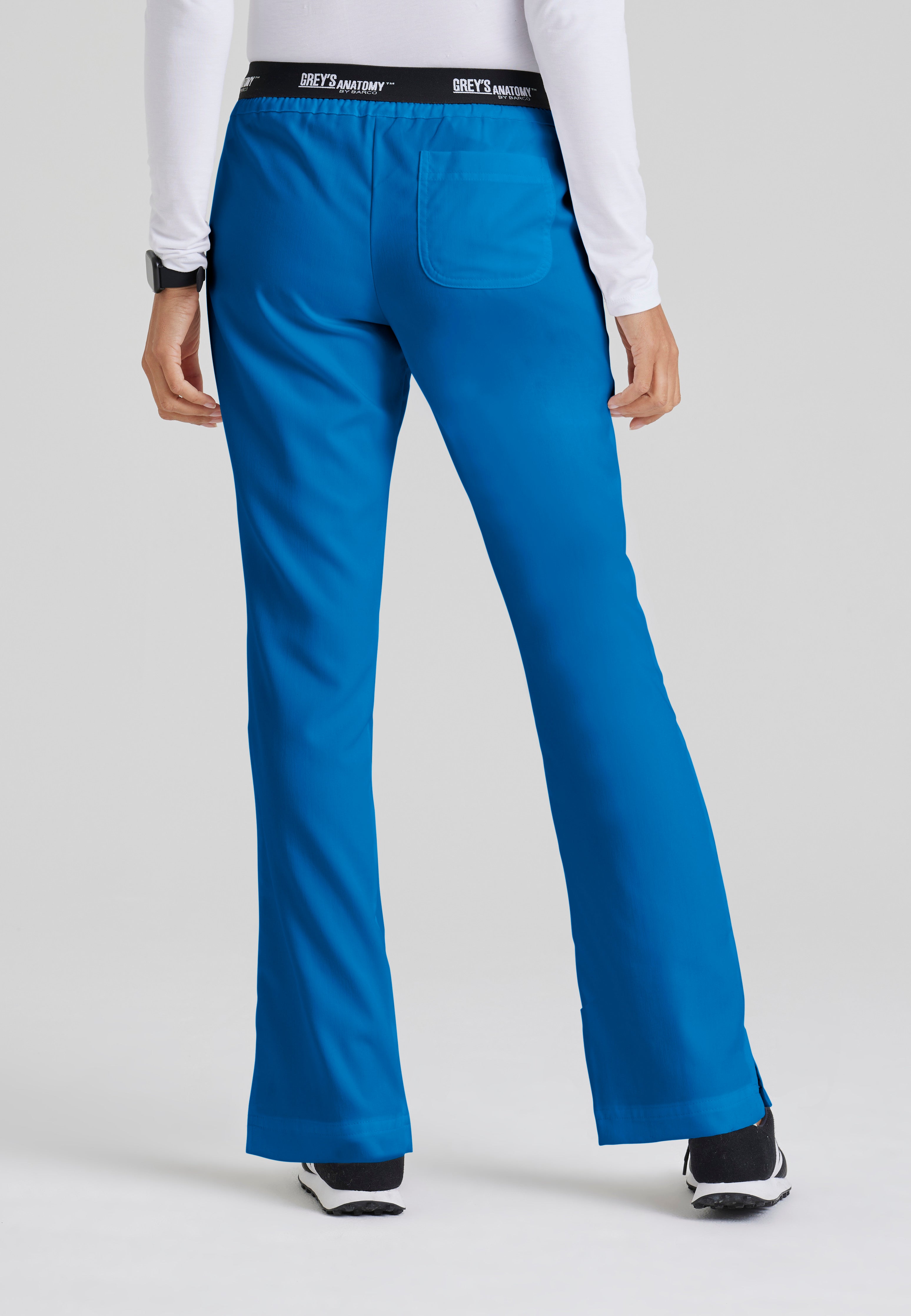 Back View of the Aubrey 3-Pocket Low-Rise Flared Leg Scrub Pant in New Royal from Grey's Anatomy™ by Barco Classic