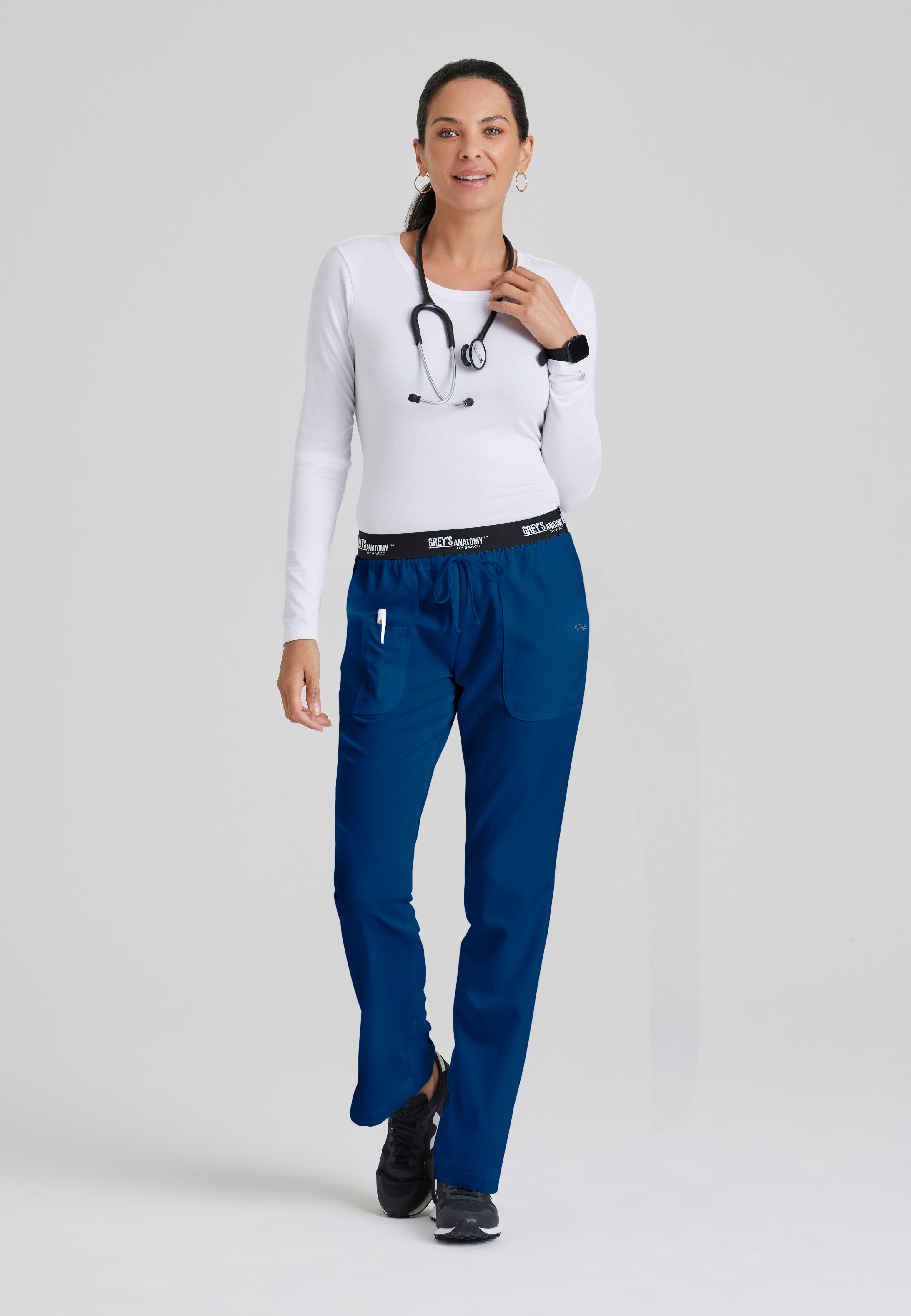 Full Body View of the Aubrey 3-Pocket Low-Rise Flared Leg Scrub Pant in Indigo from Grey's Anatomy™ by Barco Classic