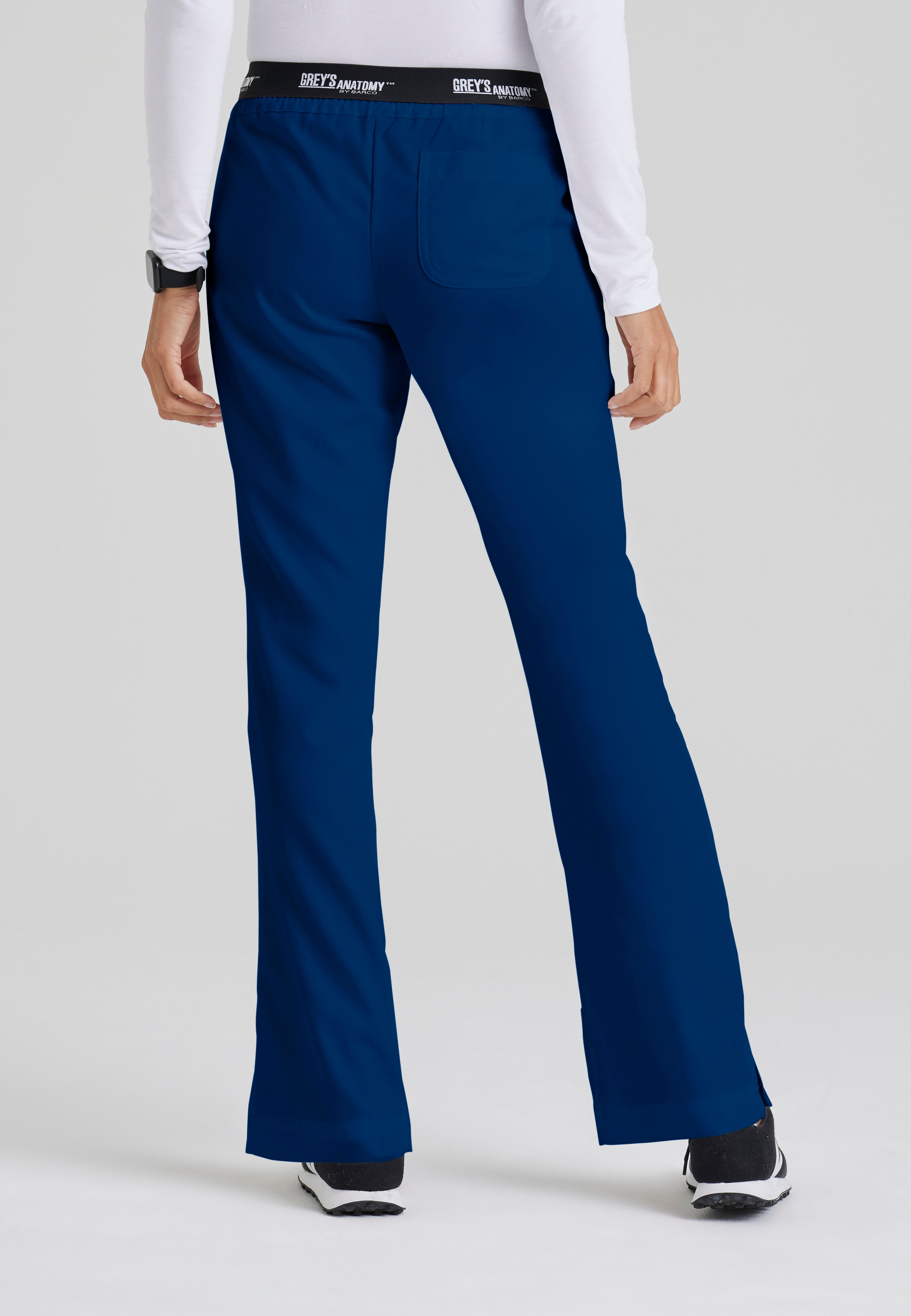 Back View of the Aubrey 3-Pocket Low-Rise Flared Leg Scrub Pant in Indigo from Grey's Anatomy™ by Barco Classic