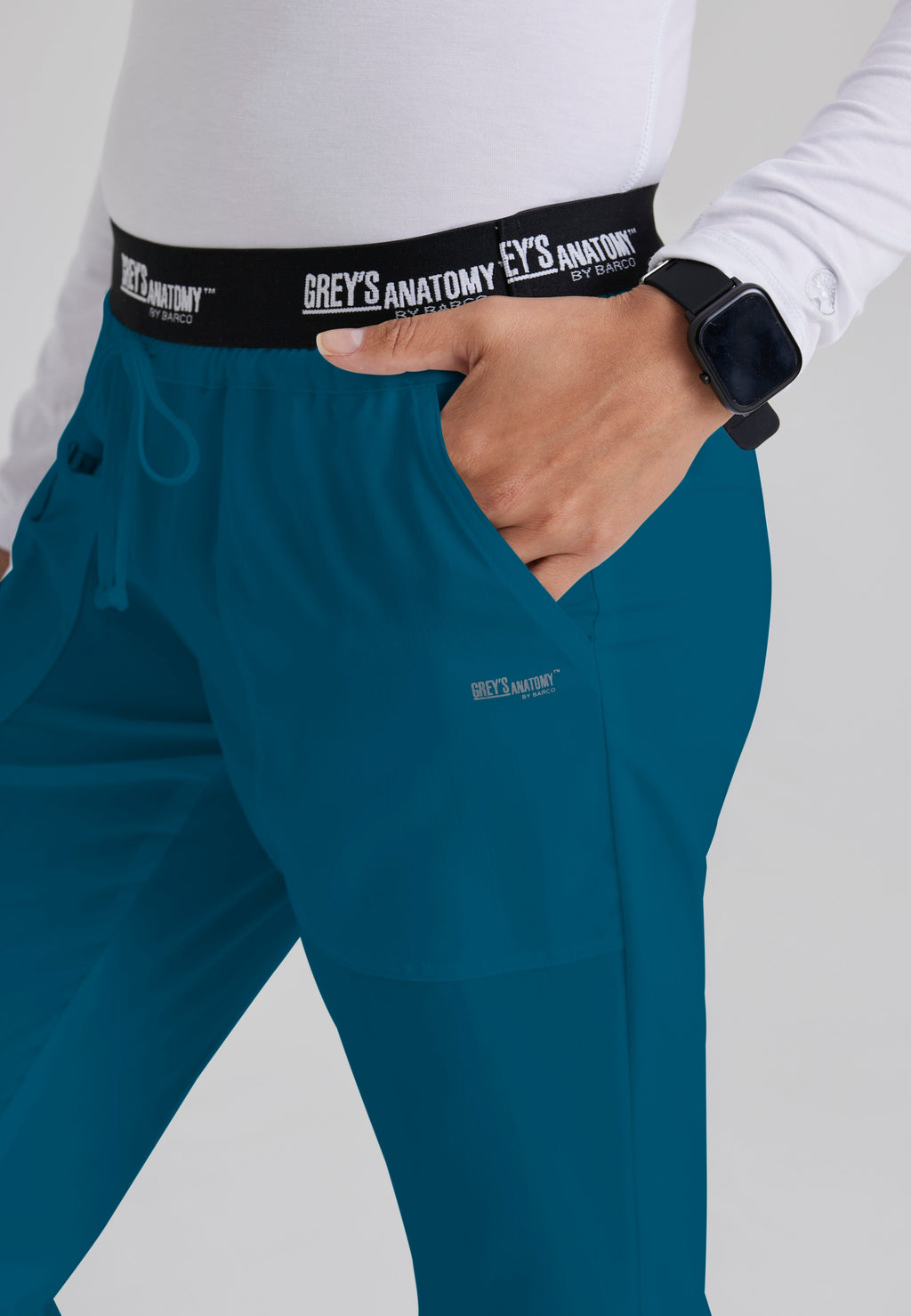 Detail Shot of the Aubrey 3-Pocket Low-Rise Flared Leg Scrub Pant in Bahama from Grey's Anatomy™ by Barco Classic