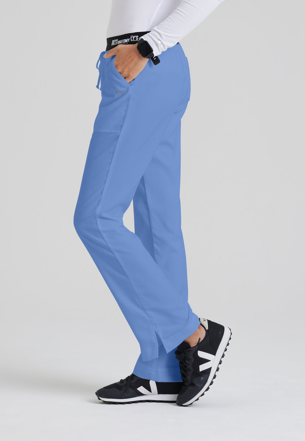 Side View of the Aubrey 3-Pocket Low-Rise Flared Leg Scrub Pant in Ciel Blue from Grey's Anatomy™ by Barco Classic