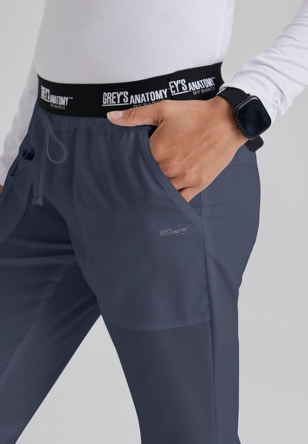 Detail Shot of the Aubrey 3-Pocket Low-Rise Flared Leg Scrub Pant in Steel from Grey's Anatomy™ by Barco Classic