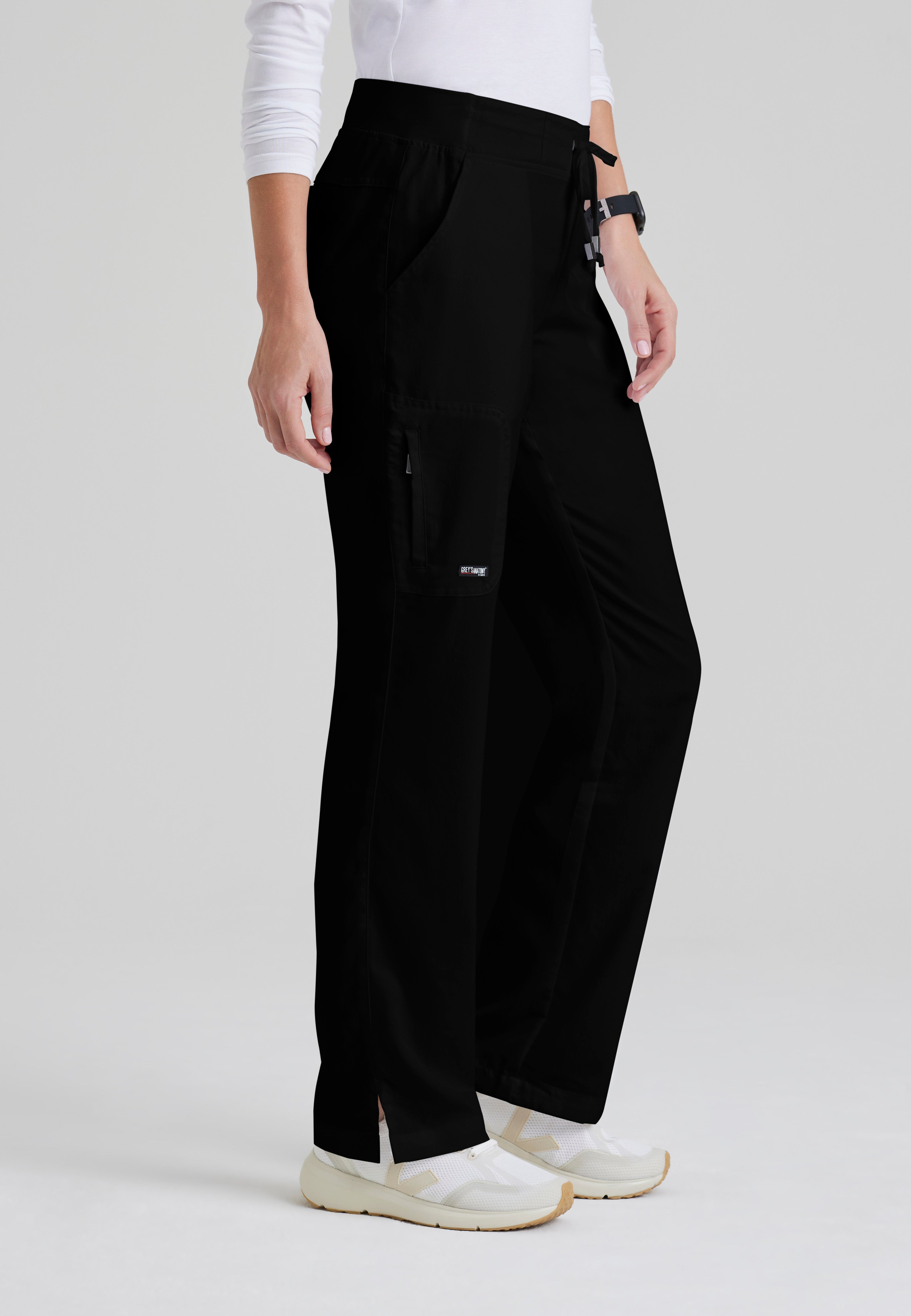 Side View of the Mia 6-Pocket Mid-Rise Straight Leg Scrub Pant in Black from Grey's Anatomy™ by Barco Classic