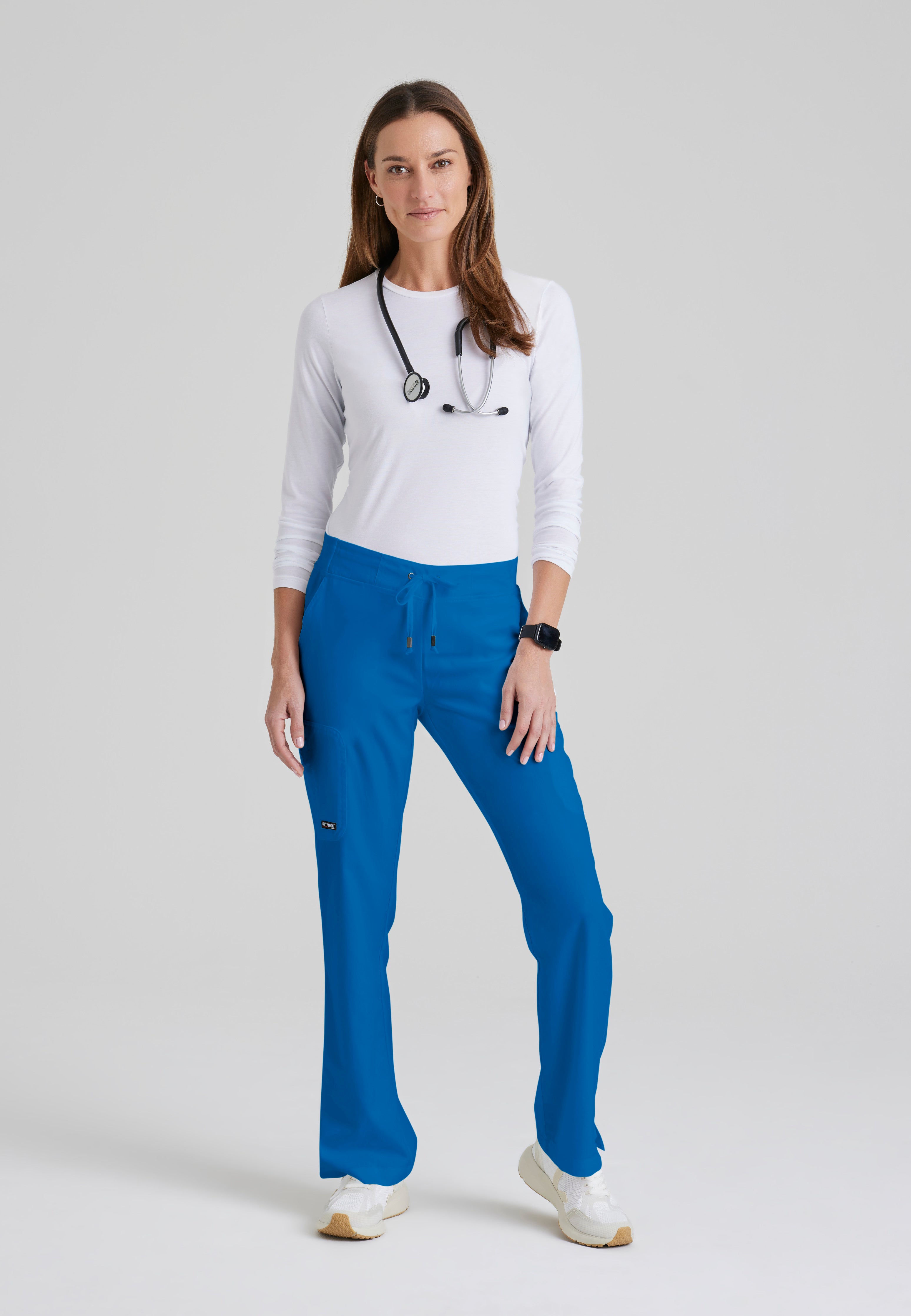 Full Body View of the Mia 6-Pocket Mid-Rise Straight Leg Scrub Pant in New Royal from Grey's Anatomy™ by Barco Classic