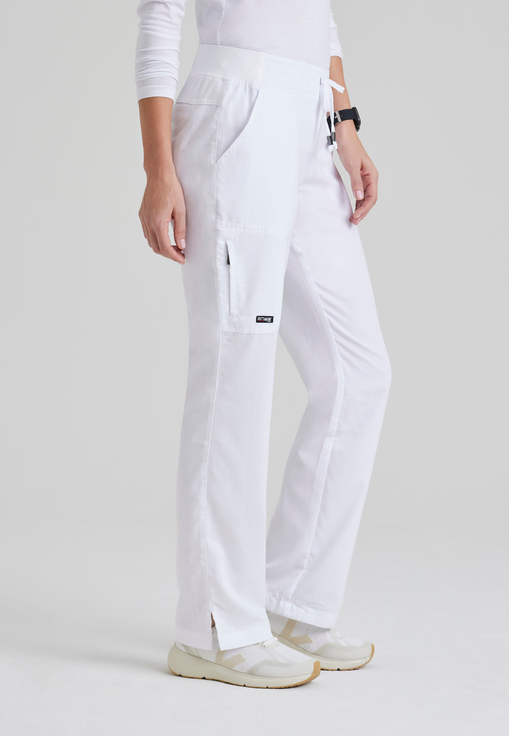 Side View of the Mia 6-Pocket Mid-Rise Straight Leg Scrub Pant in White from Grey's Anatomy™ by Barco Classic
