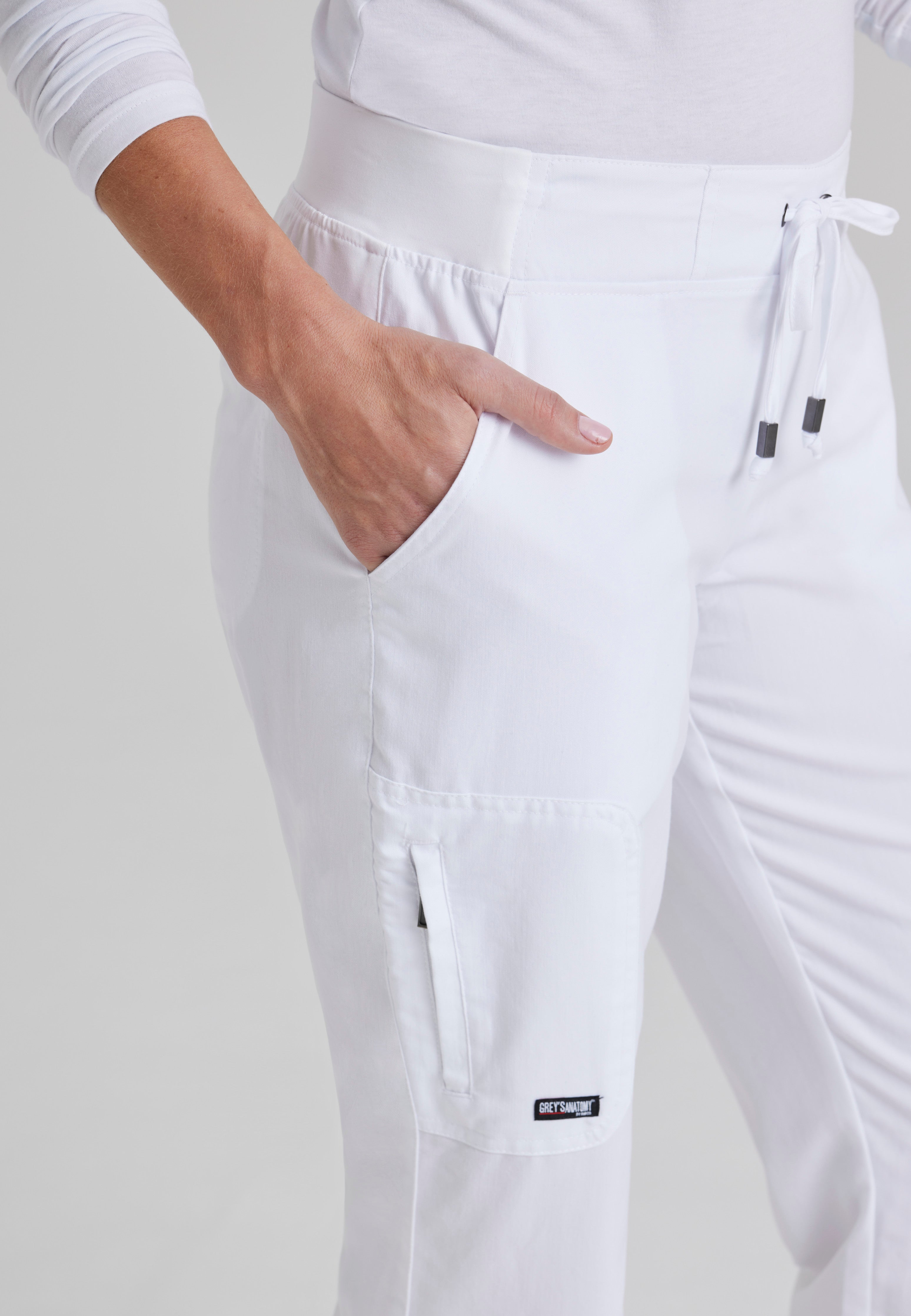 Detail Shot of the Mia 6-Pocket Mid-Rise Straight Leg Scrub Pant in White from Grey's Anatomy™ by Barco Classic