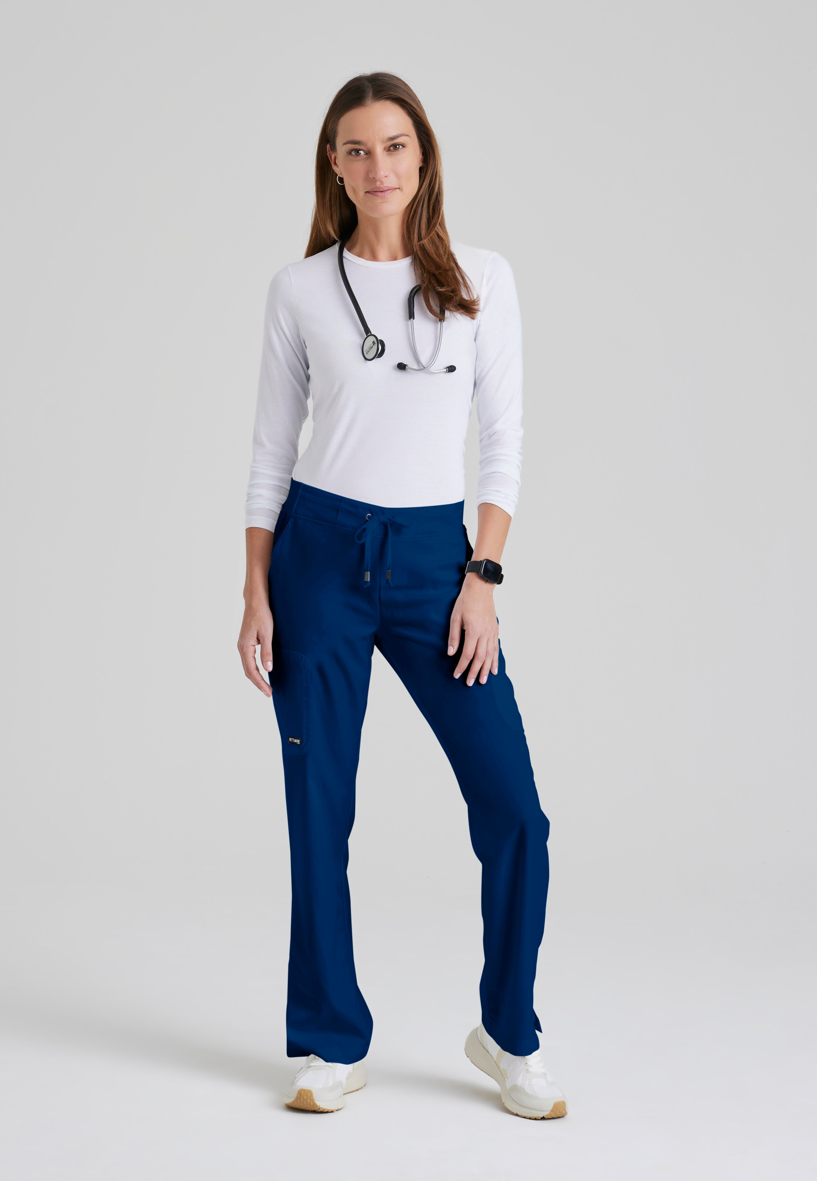 Full Body View of the Mia 6-Pocket Mid-Rise Straight Leg Scrub Pant in Indigo from Grey's Anatomy™ by Barco Classic