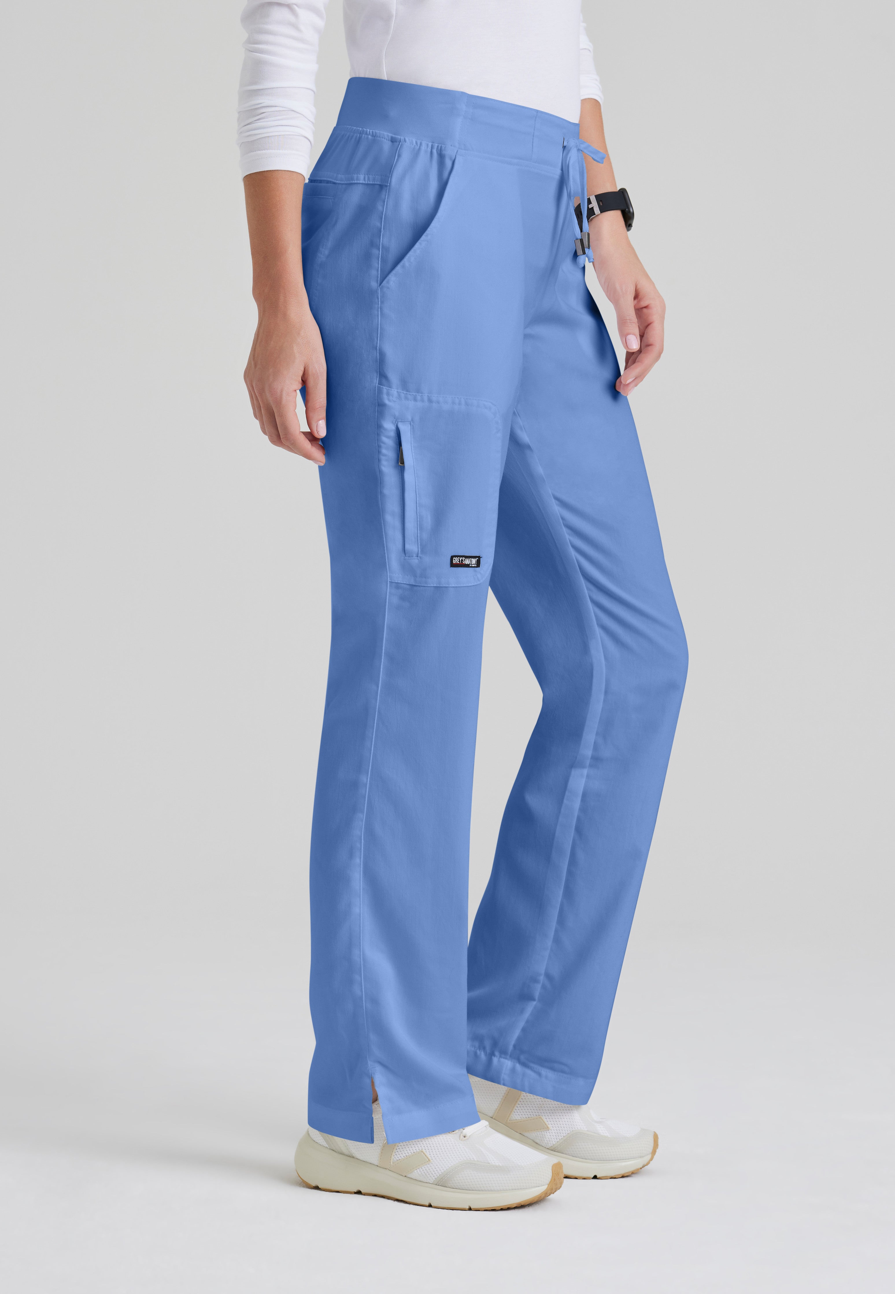 Side View of the Mia 6-Pocket Mid-Rise Straight Leg Scrub Pant in Ciel Blue from Grey's Anatomy™ by Barco Classic