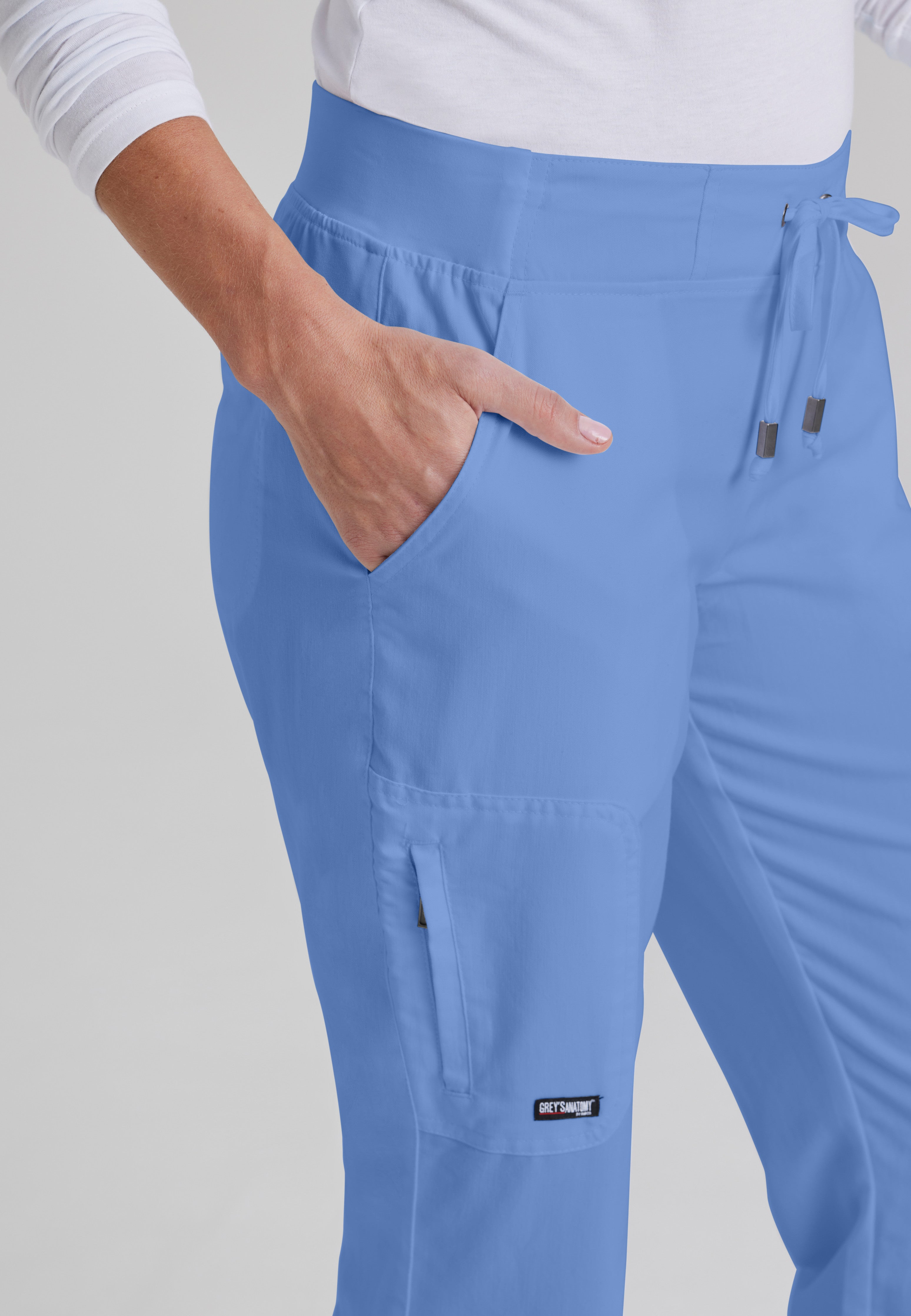 Detail Shot of the Mia 6-Pocket Mid-Rise Straight Leg Scrub Pant in Ciel Blue from Grey's Anatomy™ by Barco Classic