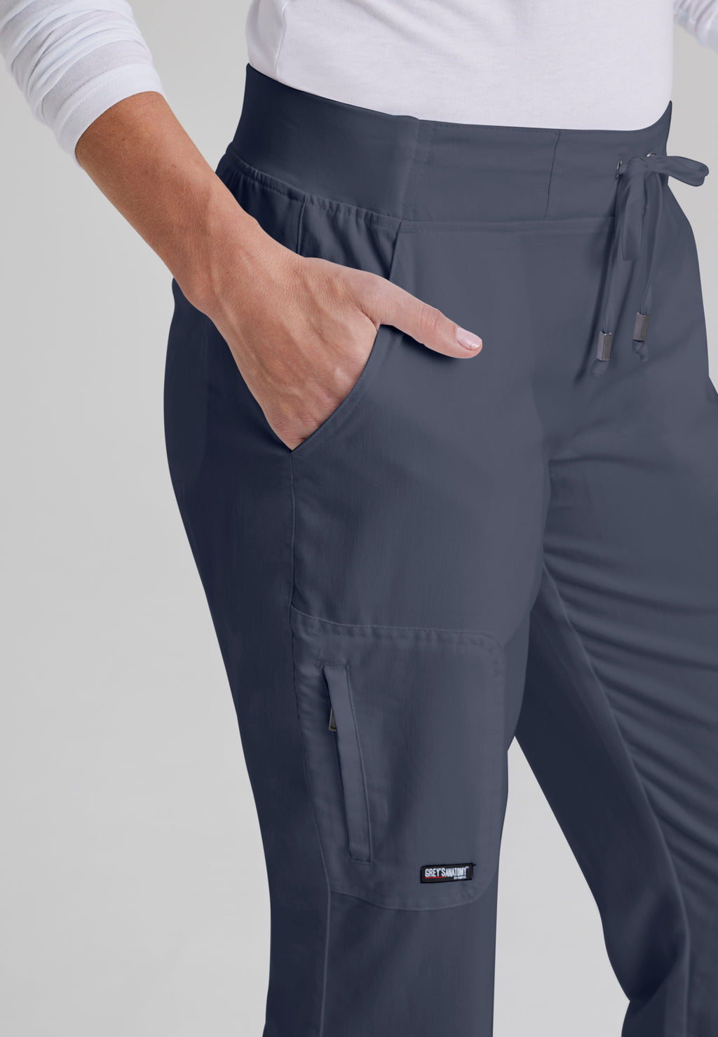 Detail Shot of the Mia 6-Pocket Mid-Rise Straight Leg Scrub Pant in Steel from Grey's Anatomy™ by Barco Classic