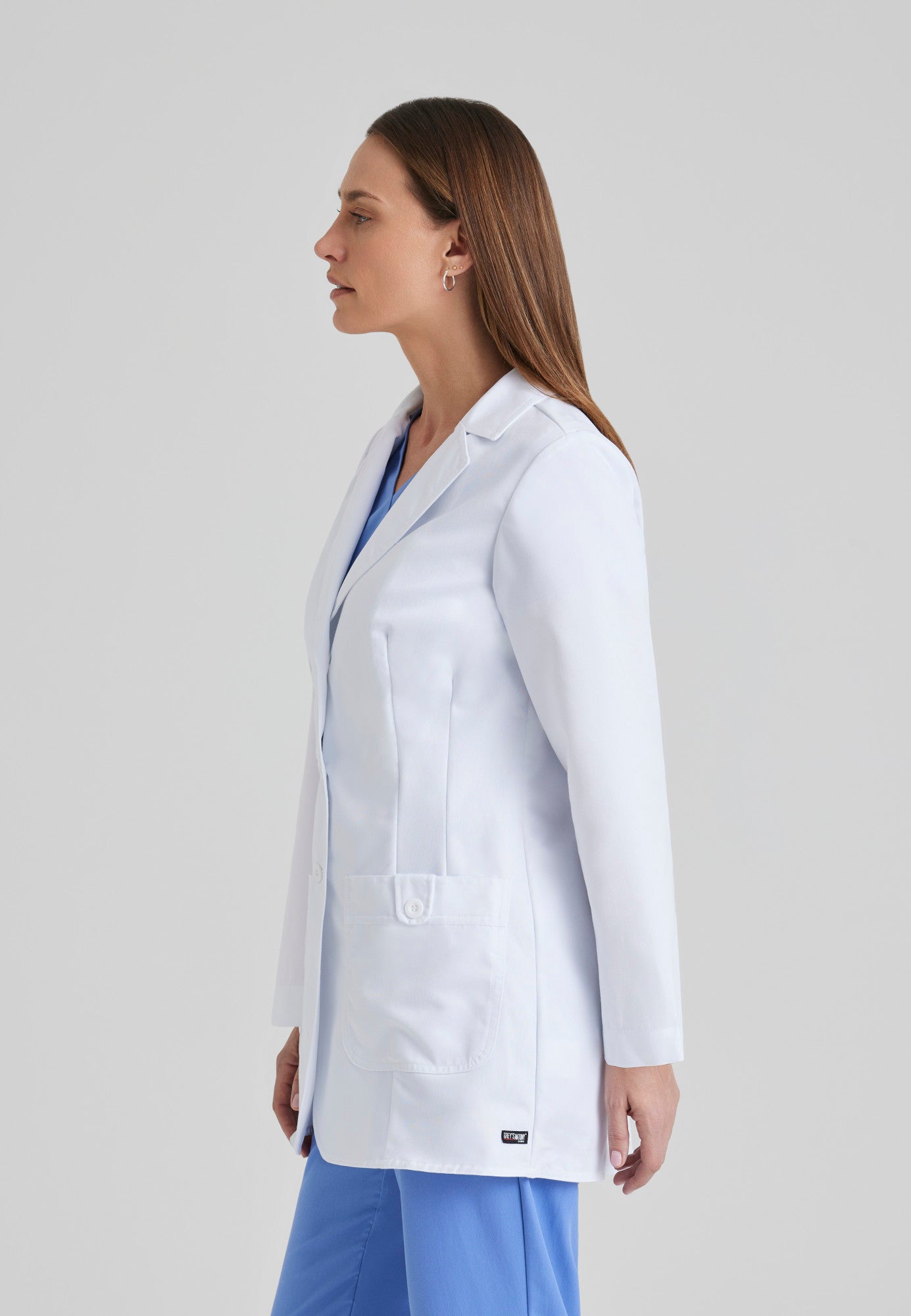 Side View of the Hannah 2-Pocket 31.5" Lab Coat in White from Grey's Anatomy™ by Barco Classic