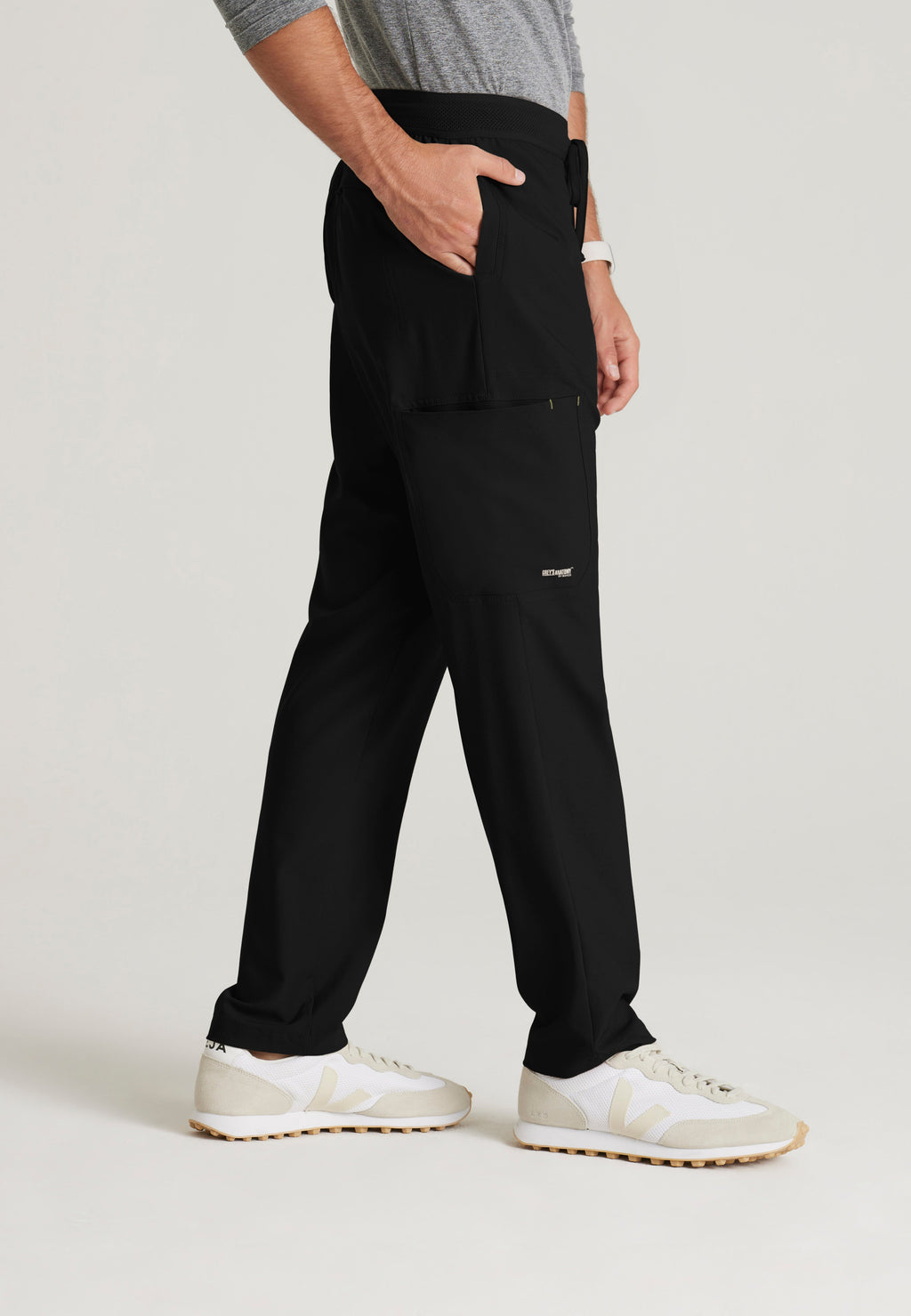 Side View of the Highland 5-Pocket Slim Straight Leg Ciclo® Scrub Pant in Black from Grey's Anatomy™ by Barco Evolve