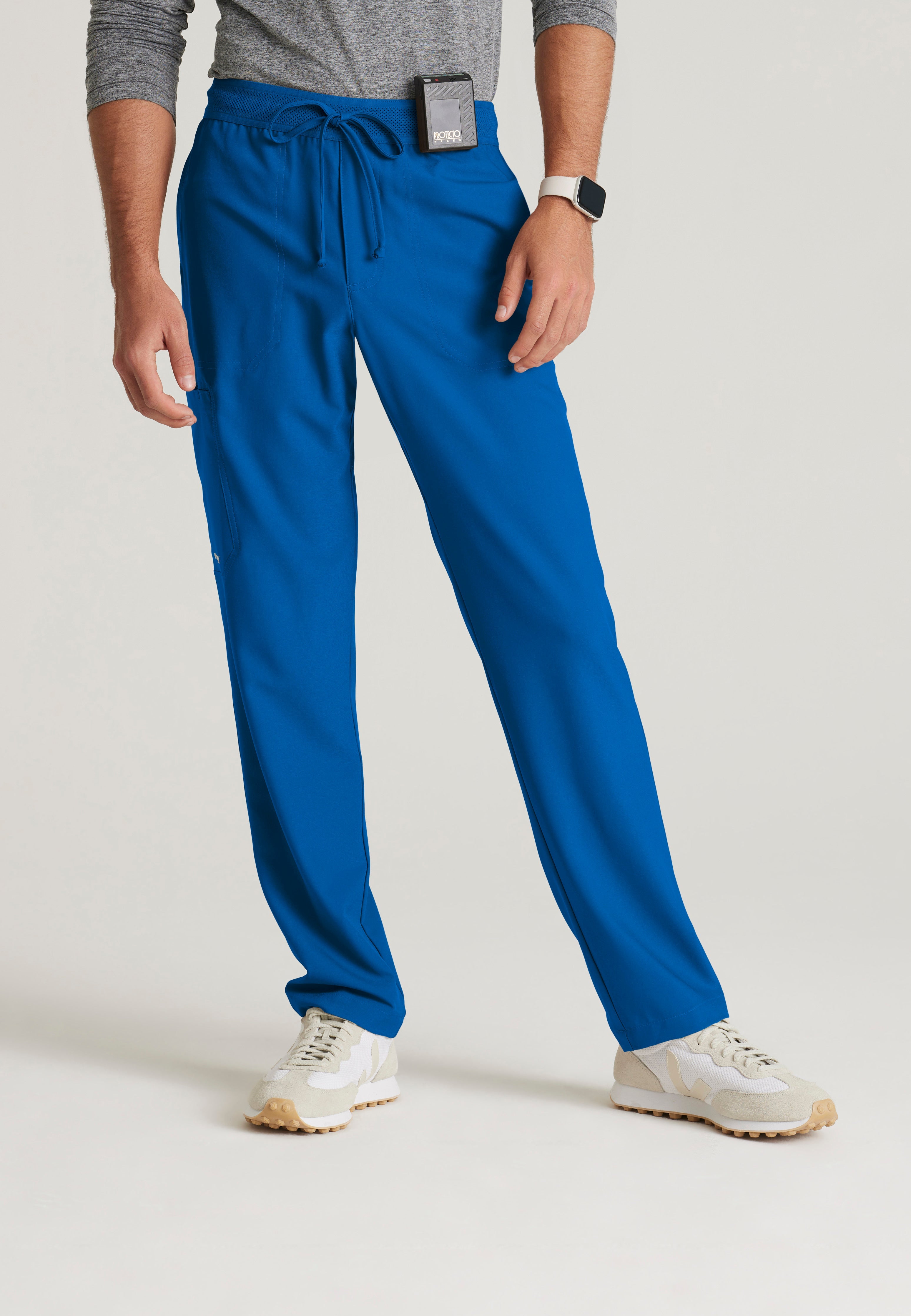 Front View of the Highland 5-Pocket Slim Straight Leg Ciclo® Scrub Pant in New Royal from Grey's Anatomy™ by Barco Evolve