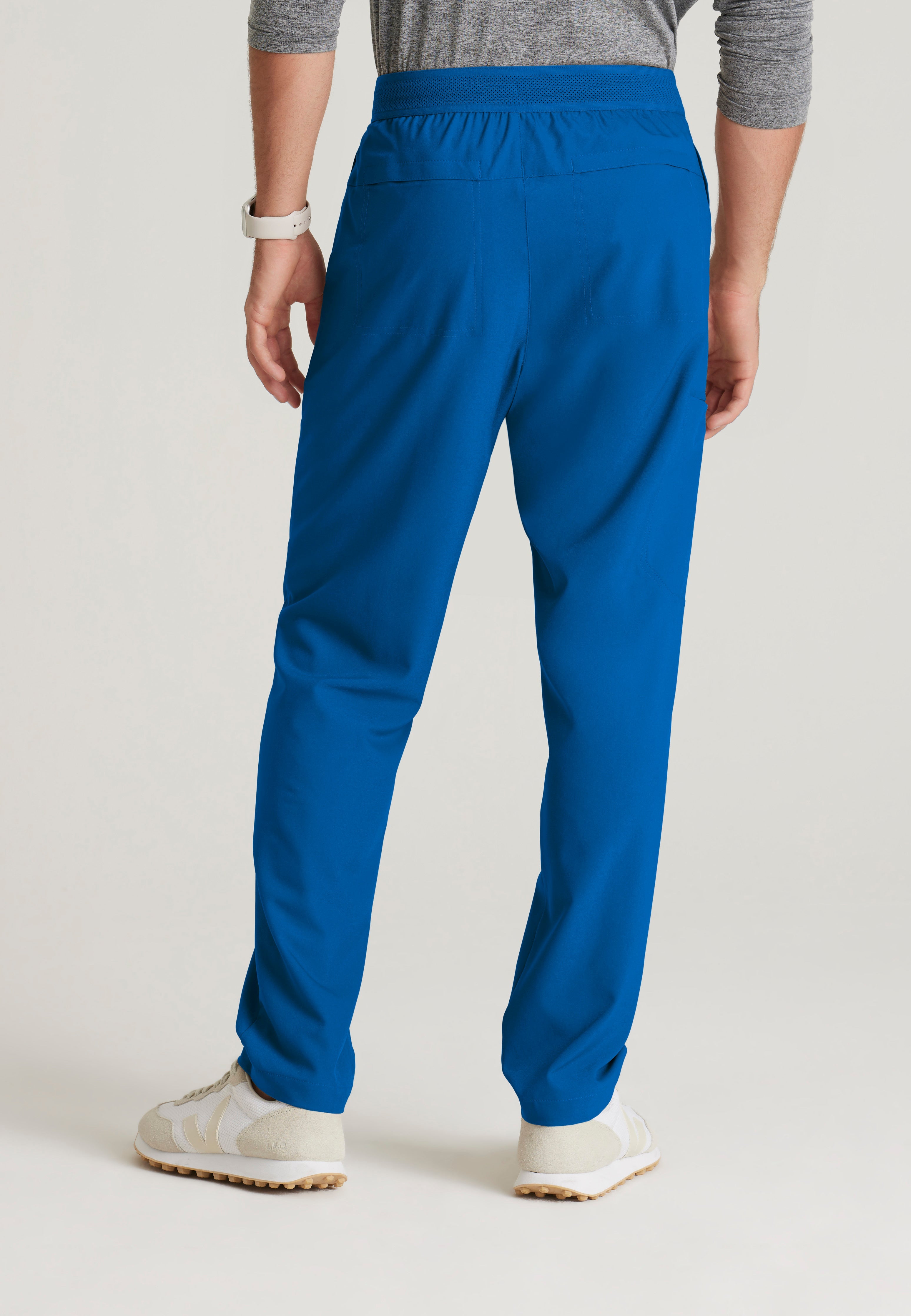 Back View of the Highland 5-Pocket Slim Straight Leg Ciclo® Scrub Pant in New Royal from Grey's Anatomy™ by Barco Evolve