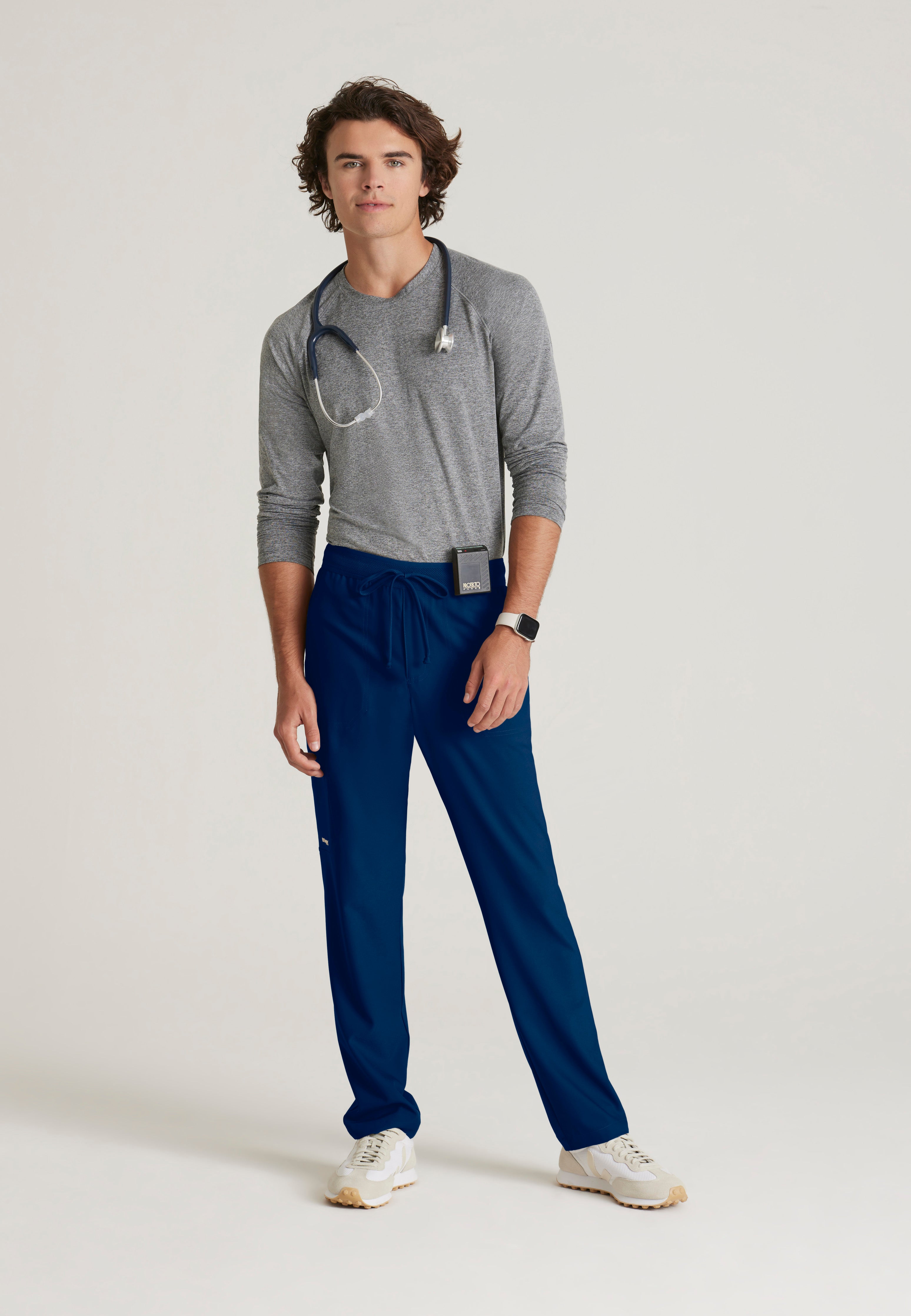 Full Body View of the Highland 5-Pocket Slim Straight Leg Ciclo® Scrub Pant in Indigo from Grey's Anatomy™ by Barco Evolve