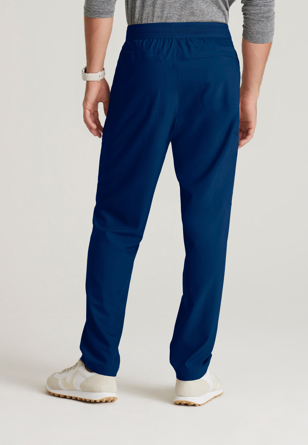 Back View of the Highland 5-Pocket Slim Straight Leg Ciclo® Scrub Pant in Indigo from Grey's Anatomy™ by Barco Evolve
