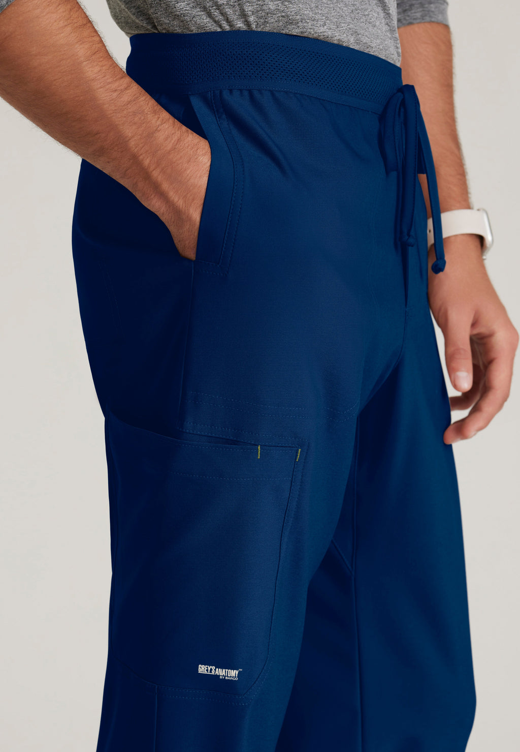 Detail Shot of the Highland 5-Pocket Slim Straight Leg Ciclo® Scrub Pant in Indigo from Grey's Anatomy™ by Barco Evolve