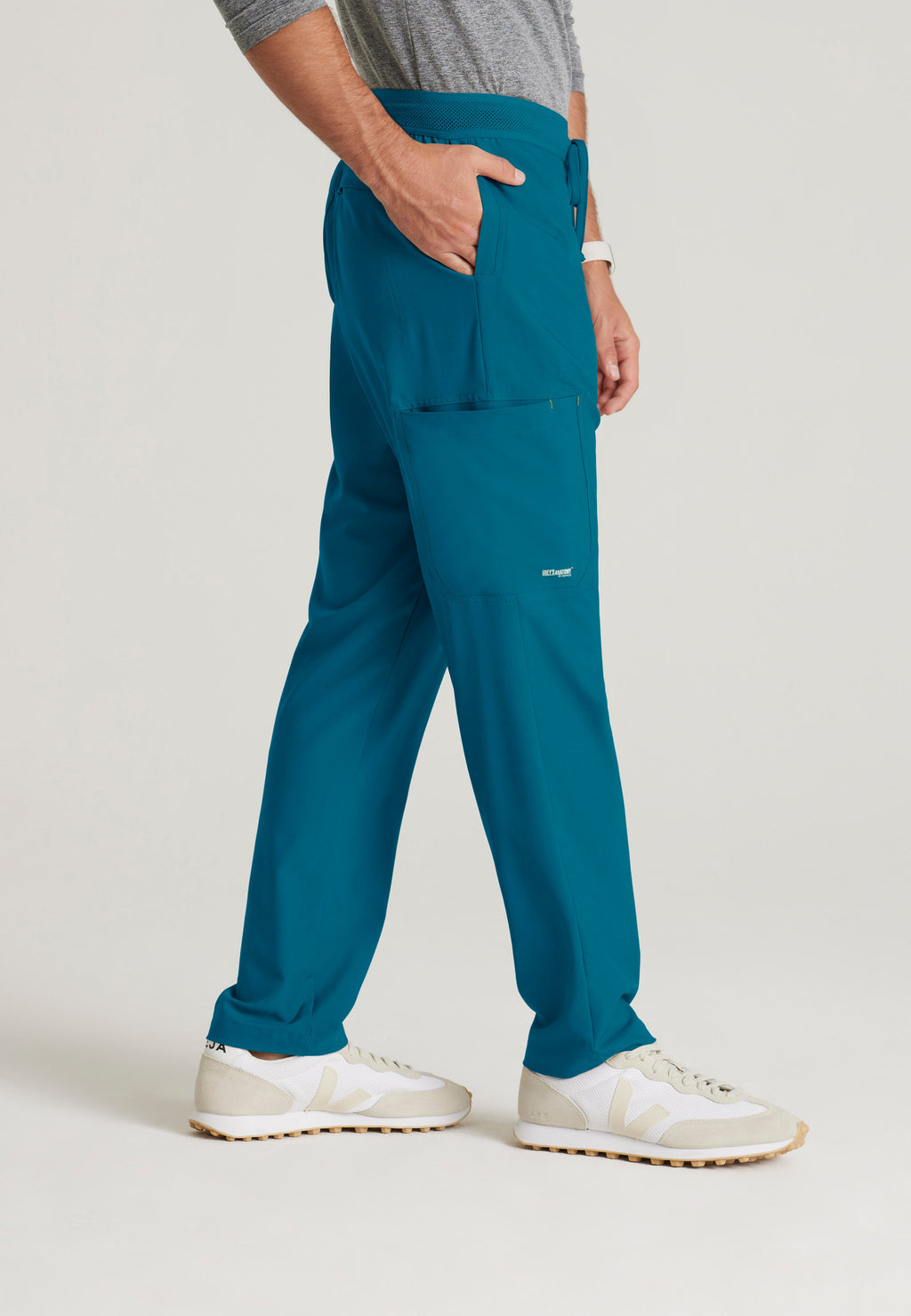 Side View of the Highland 5-Pocket Slim Straight Leg Ciclo® Scrub Pant in Bahama from Grey's Anatomy™ by Barco Evolve