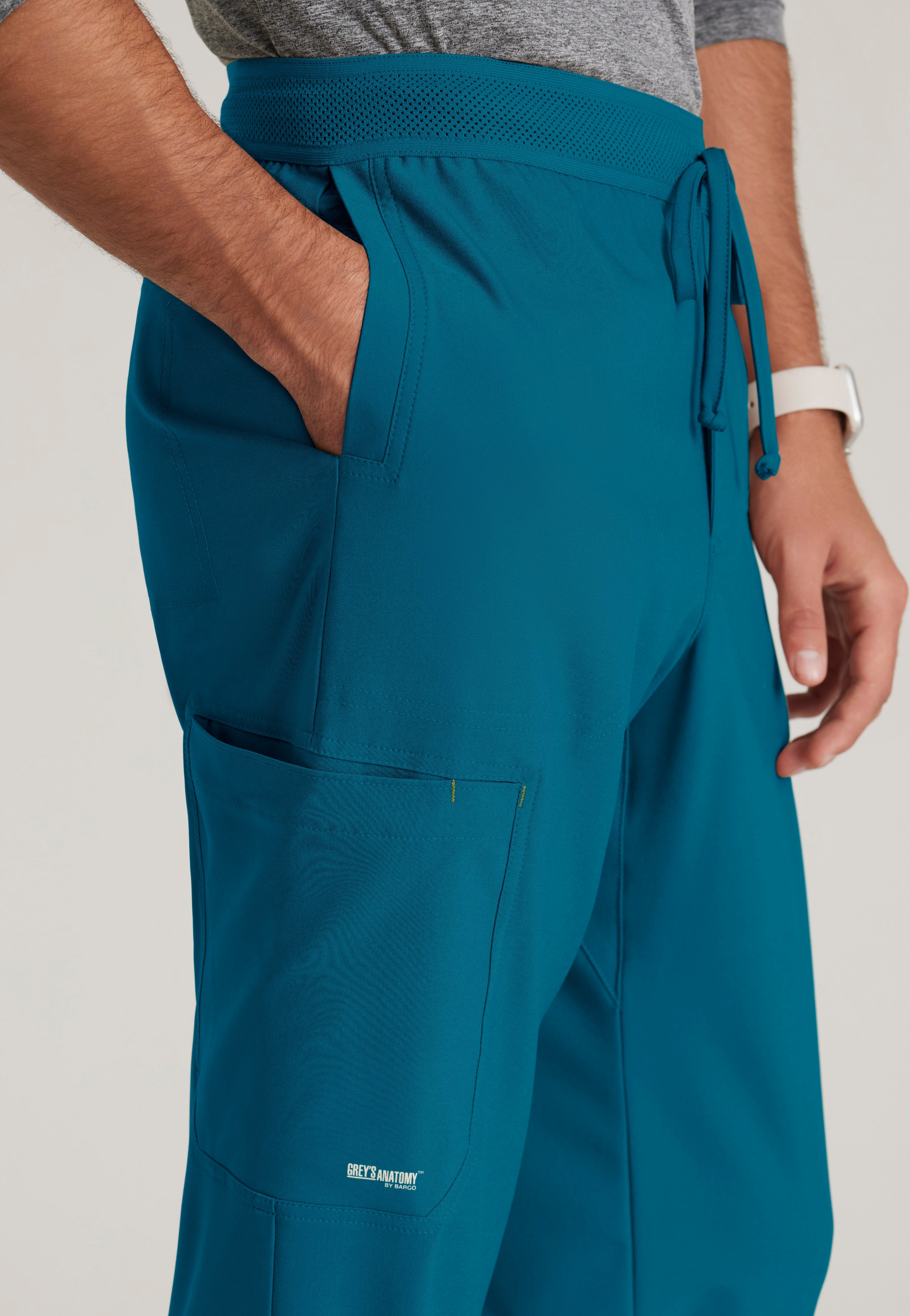 Detail Shot of the Highland 5-Pocket Slim Straight Leg Ciclo® Scrub Pant in Bahama from Grey's Anatomy™ by Barco Evolve