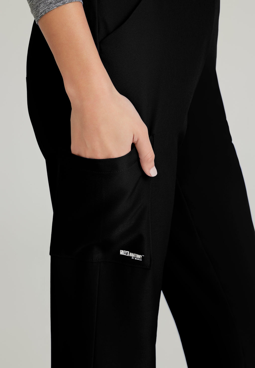 Detail Shot of the Flight 5-Pocket High Rise Tapered Leg Pant in Black from Grey's Anatomy™ by Barco Evolve