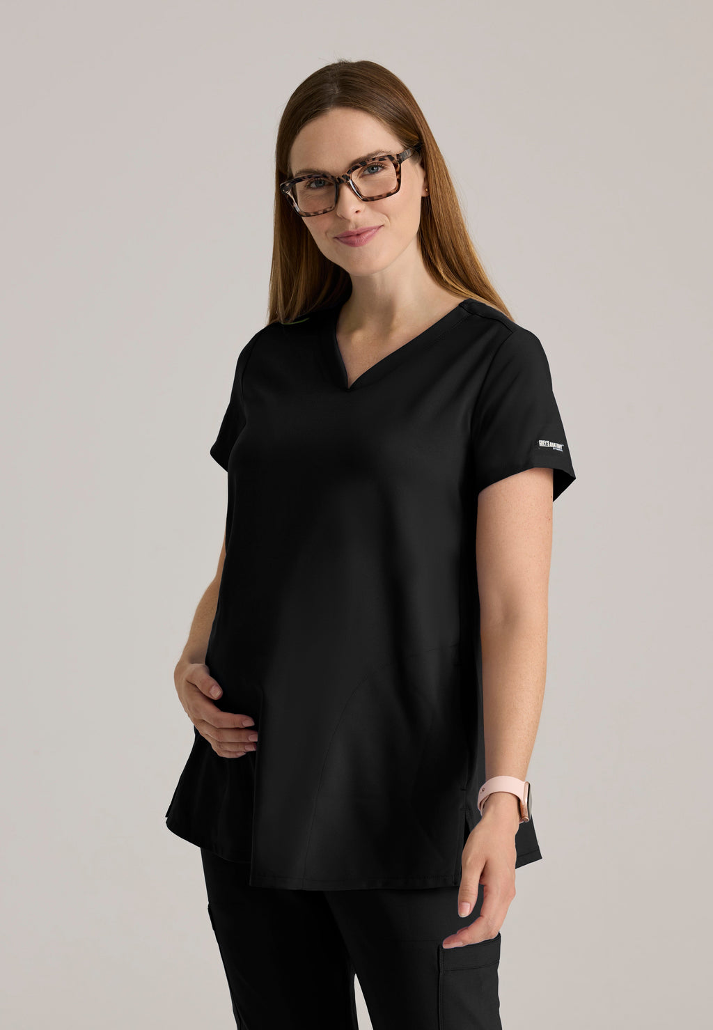 Front View of the Promise Maternity Top in Black from Grey's Anatomy™ by Barco Evolve