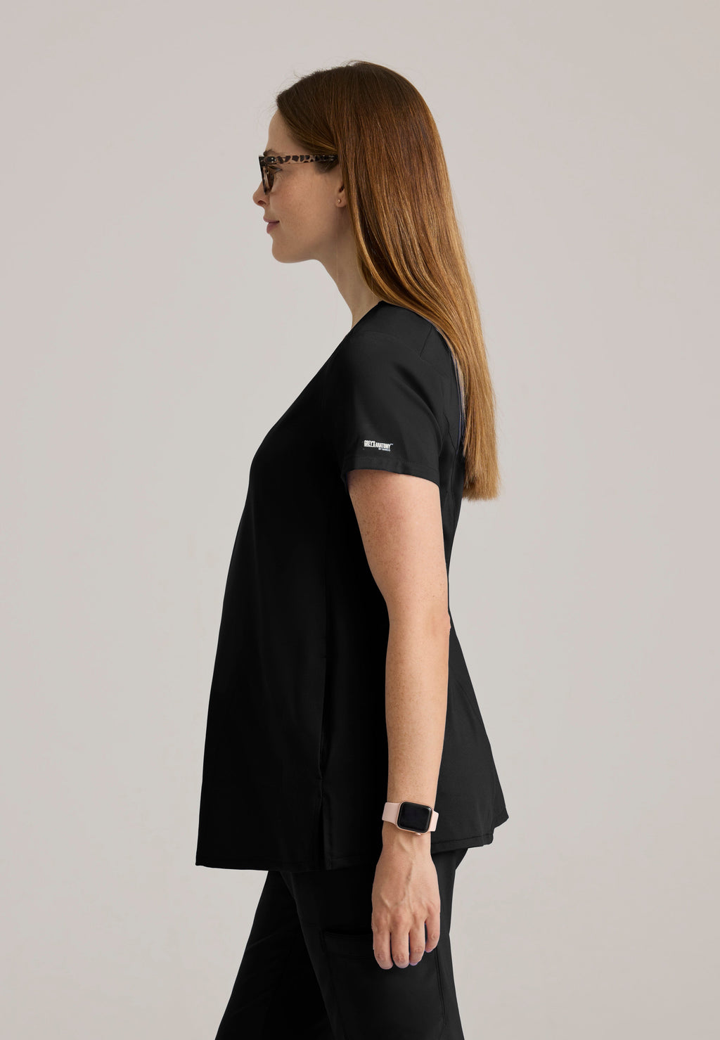 Side View of the Promise Maternity Top in Black from Grey's Anatomy™ by Barco Evolve
