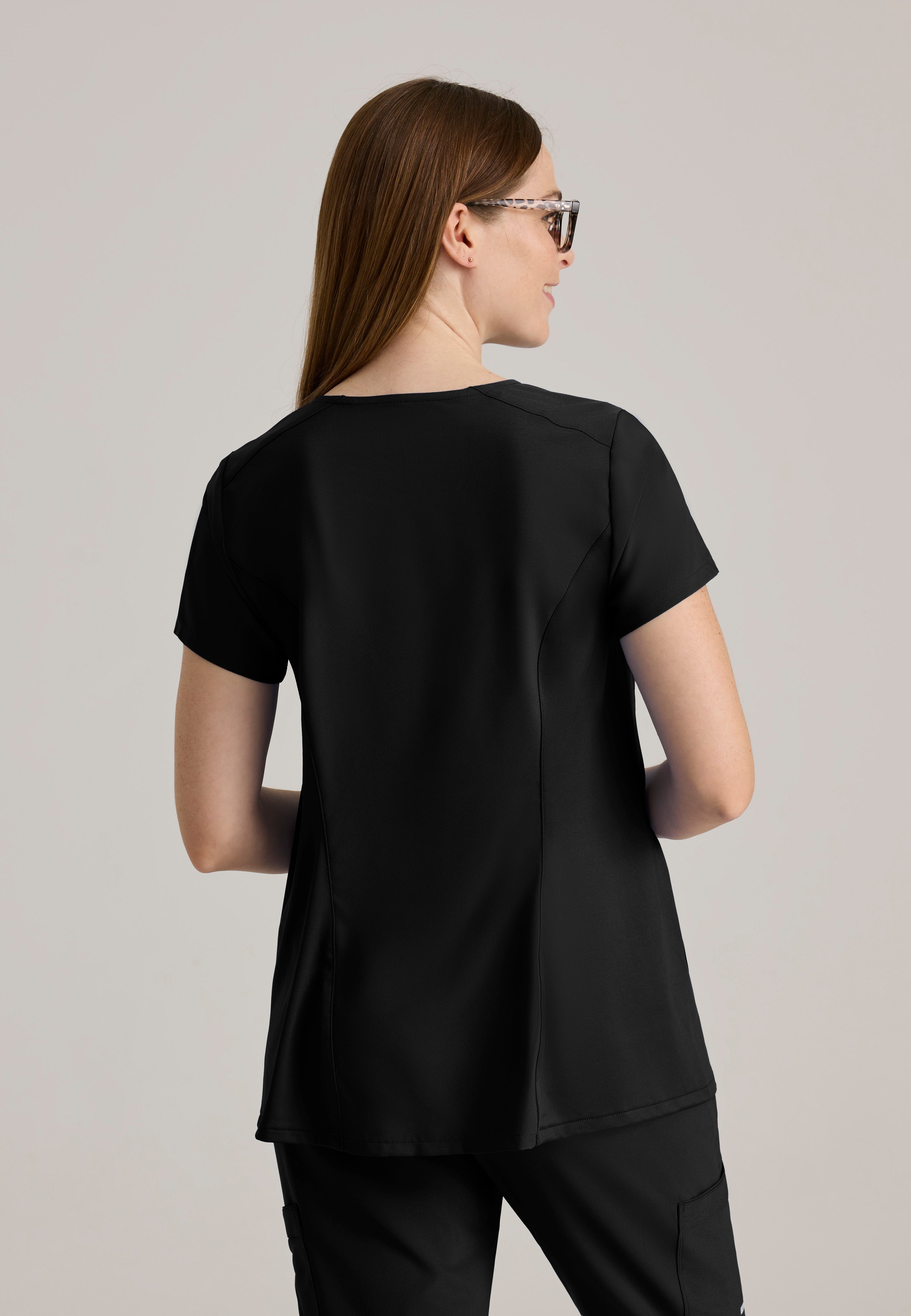 Back View of the Promise Maternity Top in Black from Grey's Anatomy™ by Barco Evolve