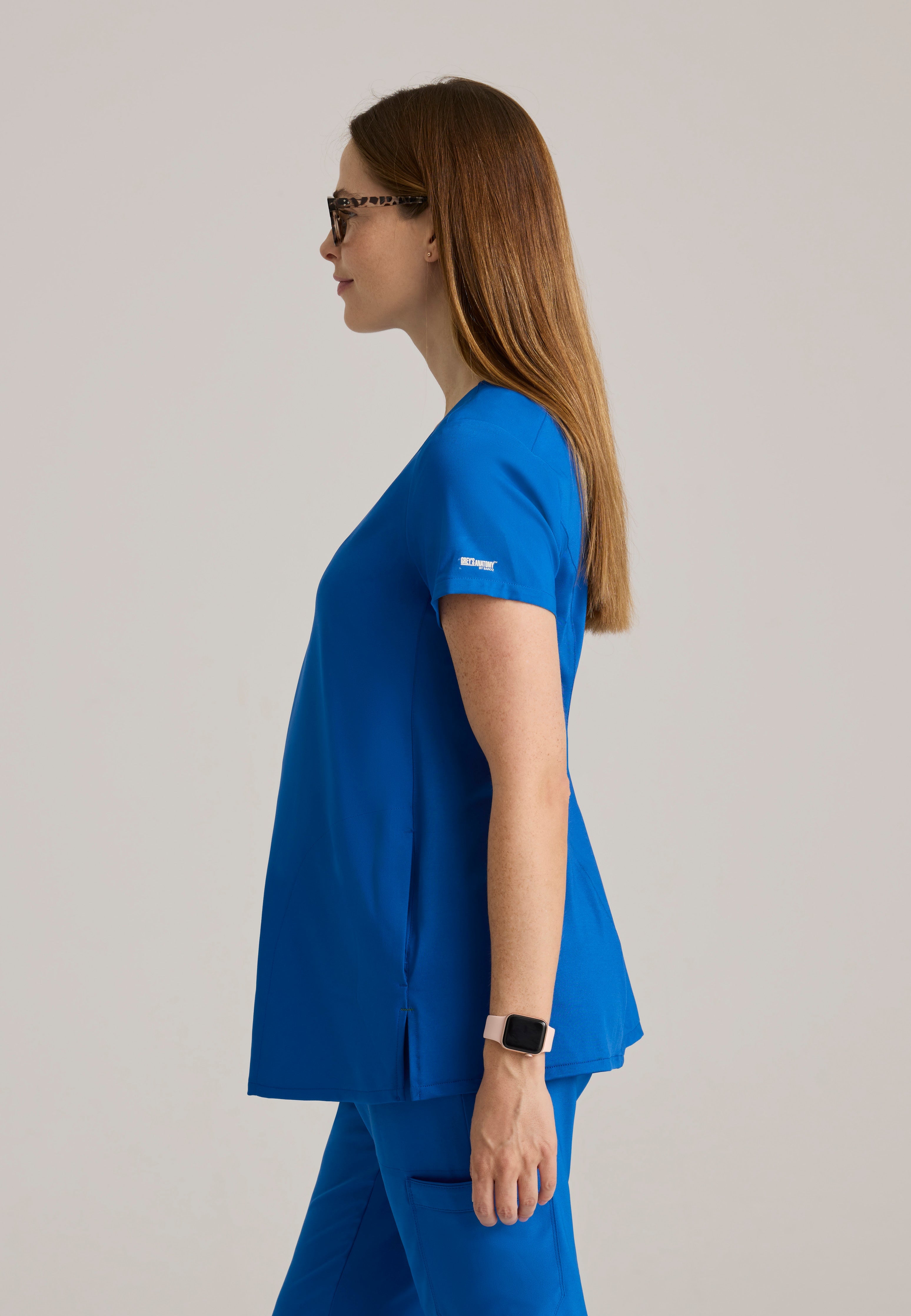 Side View of the Promise Maternity Top in New Royal from Grey's Anatomy™ by Barco Evolve