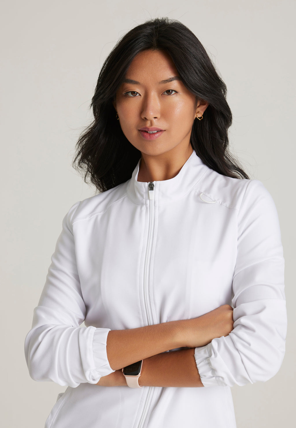 Detail Shot of the Virtue 3-Pocket Stand-Up Collar Ciclo® Scrub Jacket in White from Grey's Anatomy™ by Barco Evolve