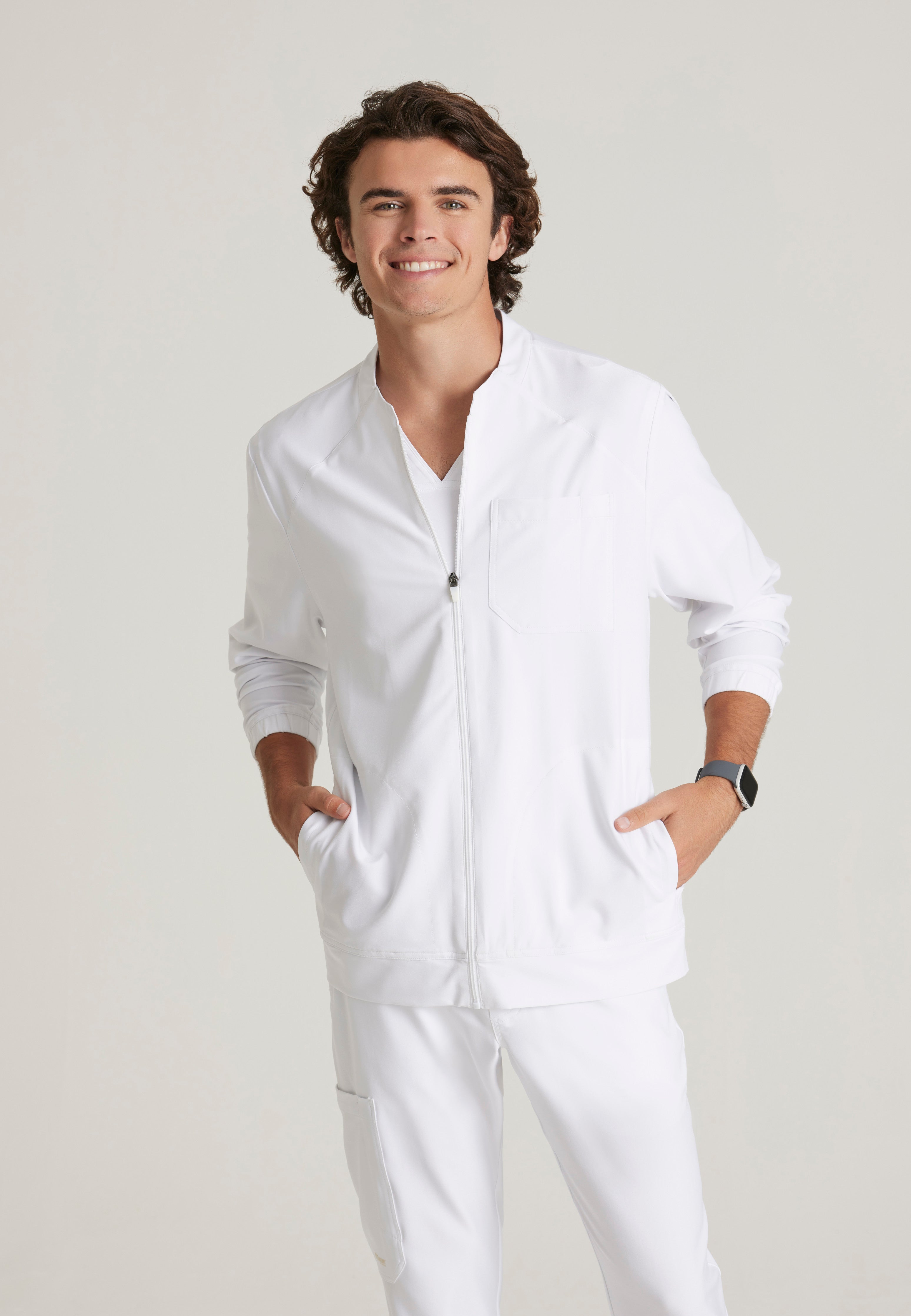 Front View of the Cycle 3-Pocket Crewneck Ciclo® Scrub Jacket in White from Grey's Anatomy™ by Barco Evolve