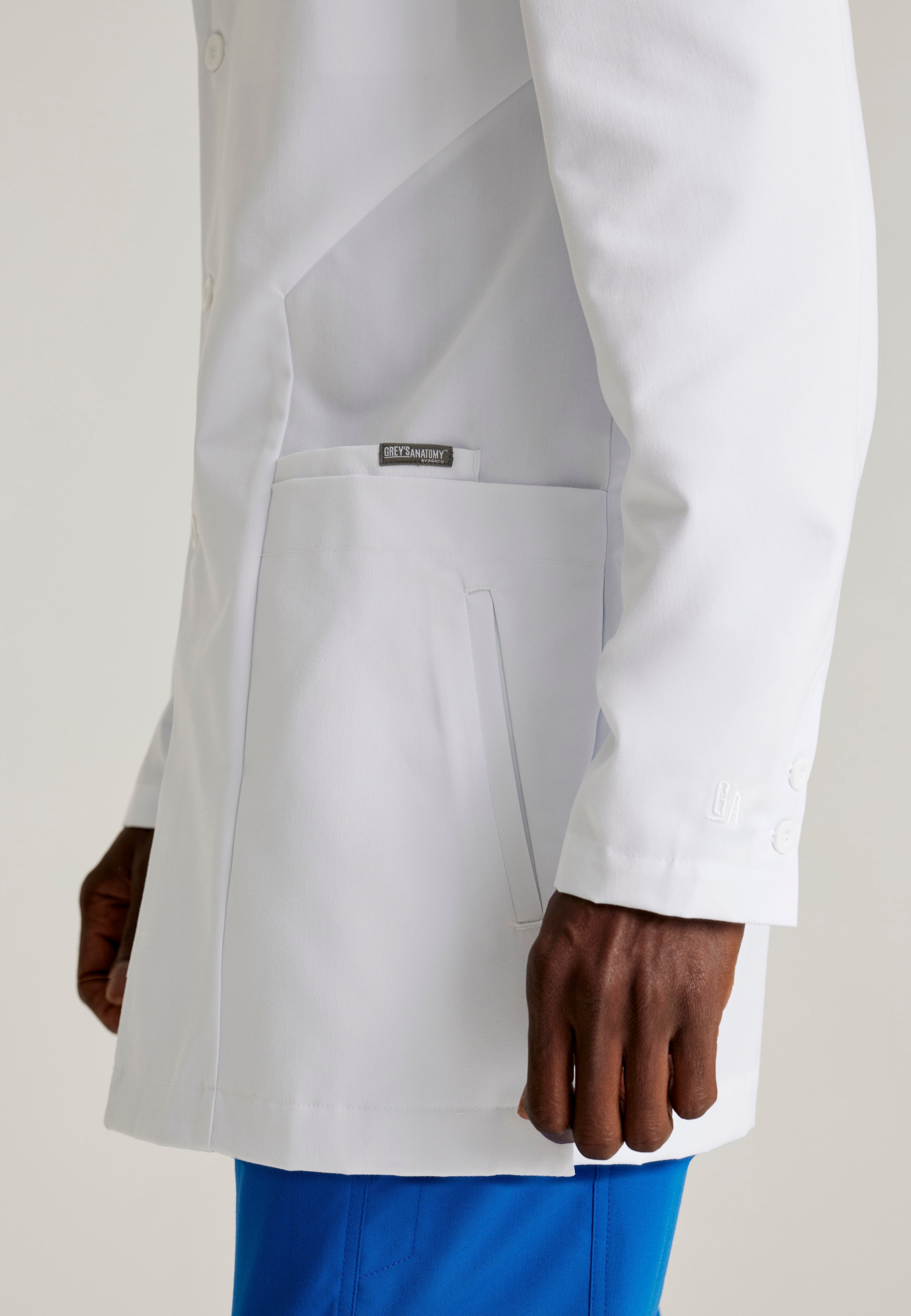 Detail Shot of the Derek 6-Pocket 35" 3-Button Lab Coat in White from Grey's Anatomy™ by Barco Classic