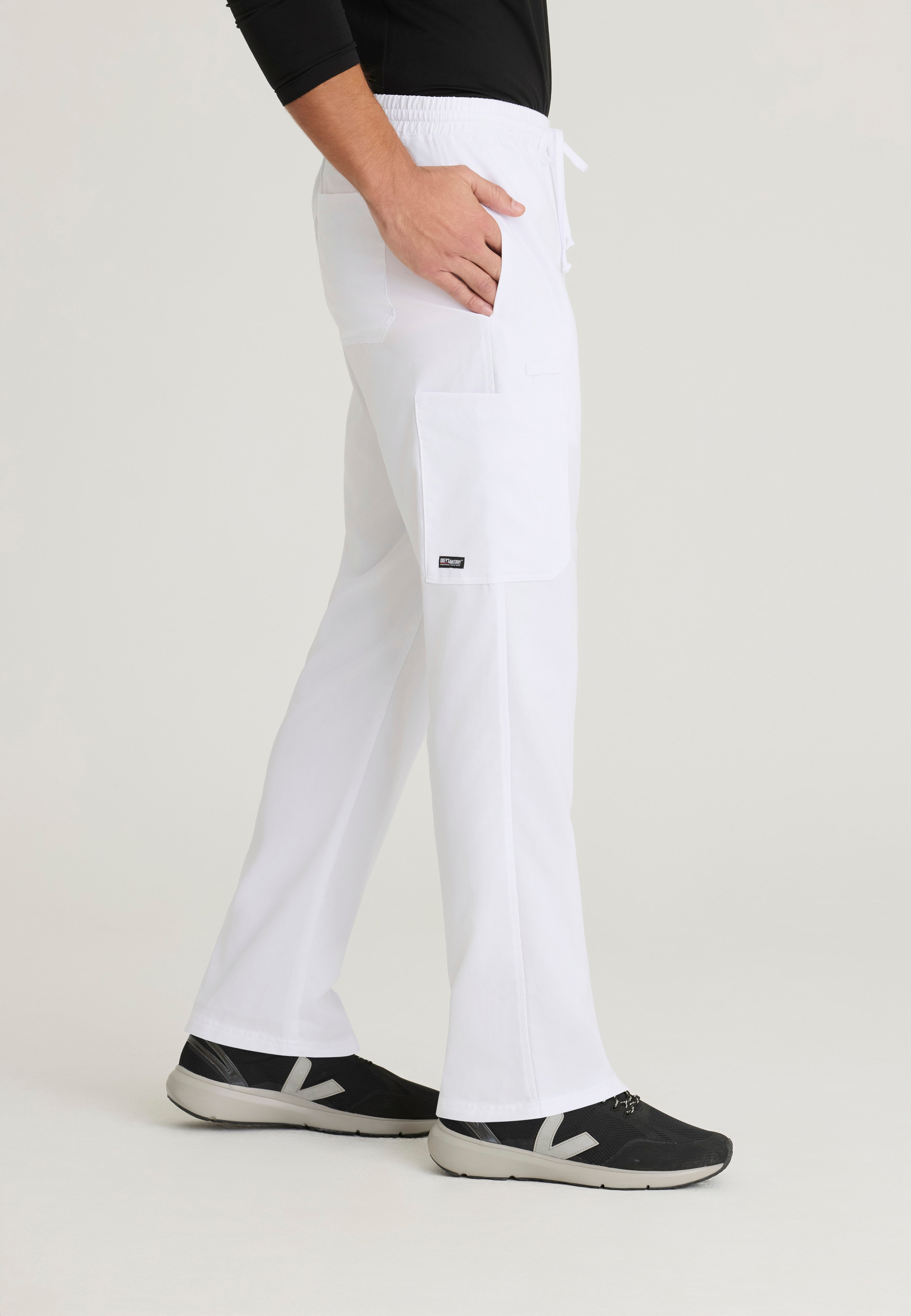 Side View of the Evan 5-Pocket Zip-Fly Scrub Pant in White from Grey's Anatomy™ by Barco Classic
