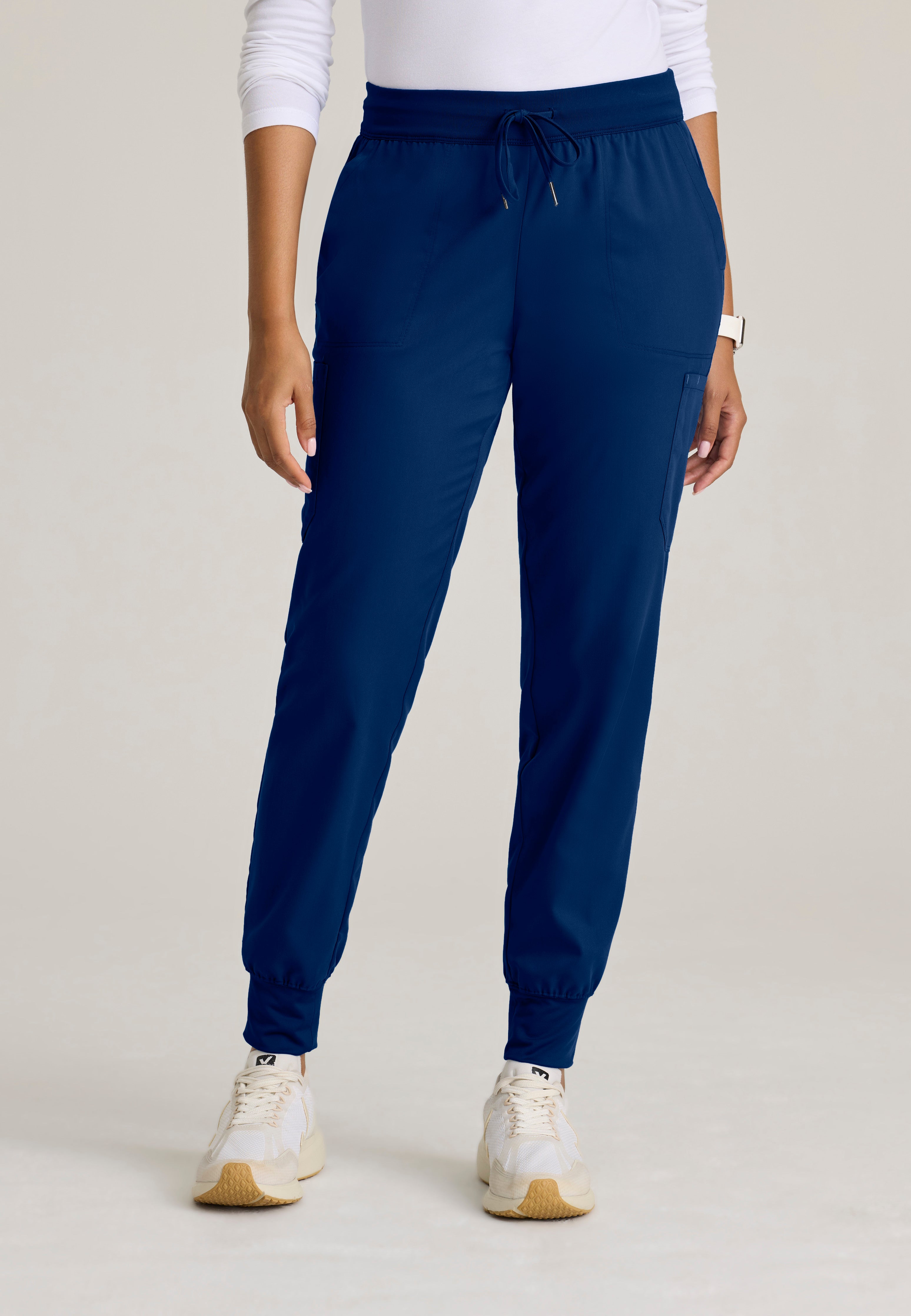 Front View of the Finley 6-Pocket Knit Waistband Jogger in Indigo from Grey's Anatomy™ by Barco Classic