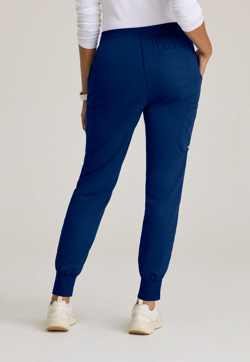 Back View of the Finley 6-Pocket Knit Waistband Jogger in Indigo from Grey's Anatomy™ by Barco Classic