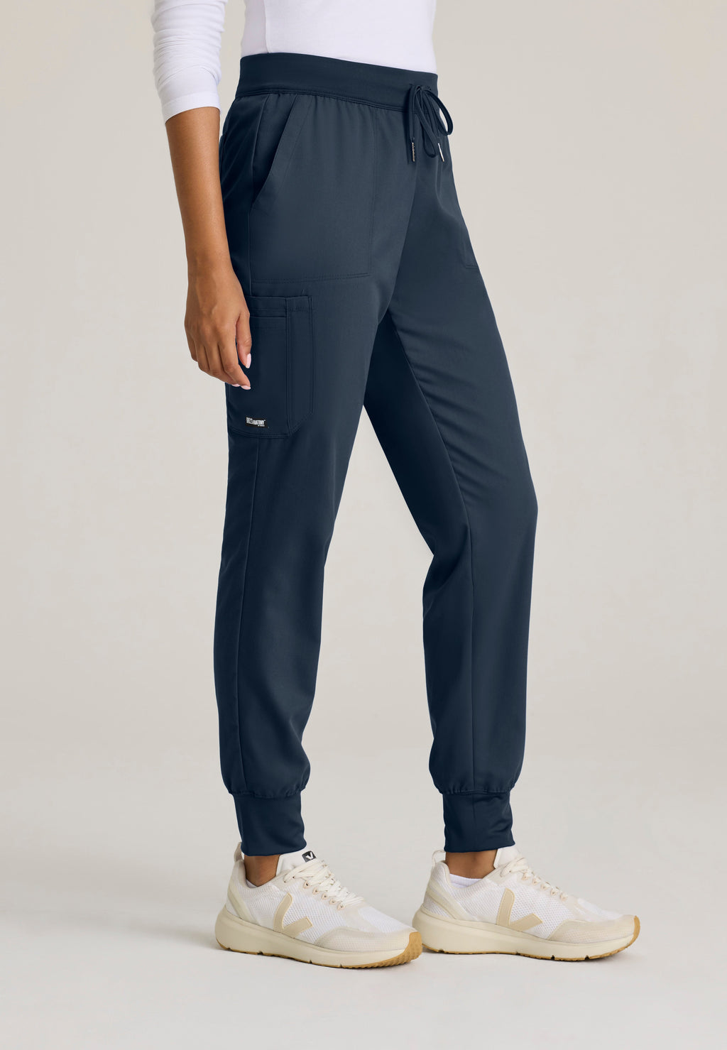 Side View of the Finley 6-Pocket Knit Waistband Jogger in Steel from Grey's Anatomy™ by Barco Classic