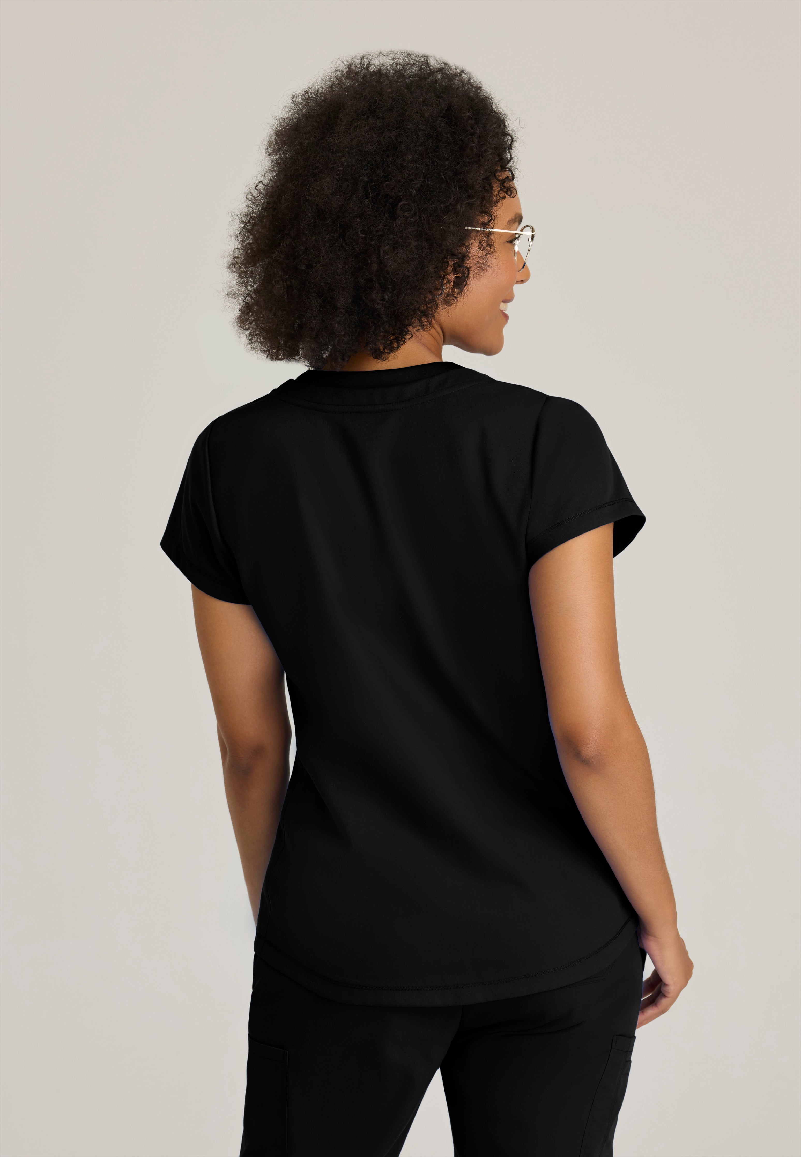 Back View of the Evelyn Pintuck Detail Scrub Top in Black from Grey's Anatomy™ by Barco Classic
