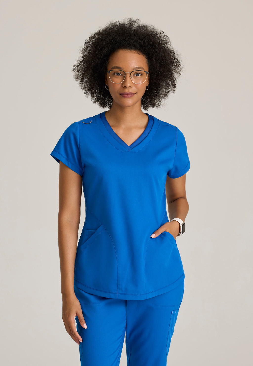 Front View of the Evelyn Pintuck Detail Scrub Top in New Royal from Grey's Anatomy™ by Barco Classic