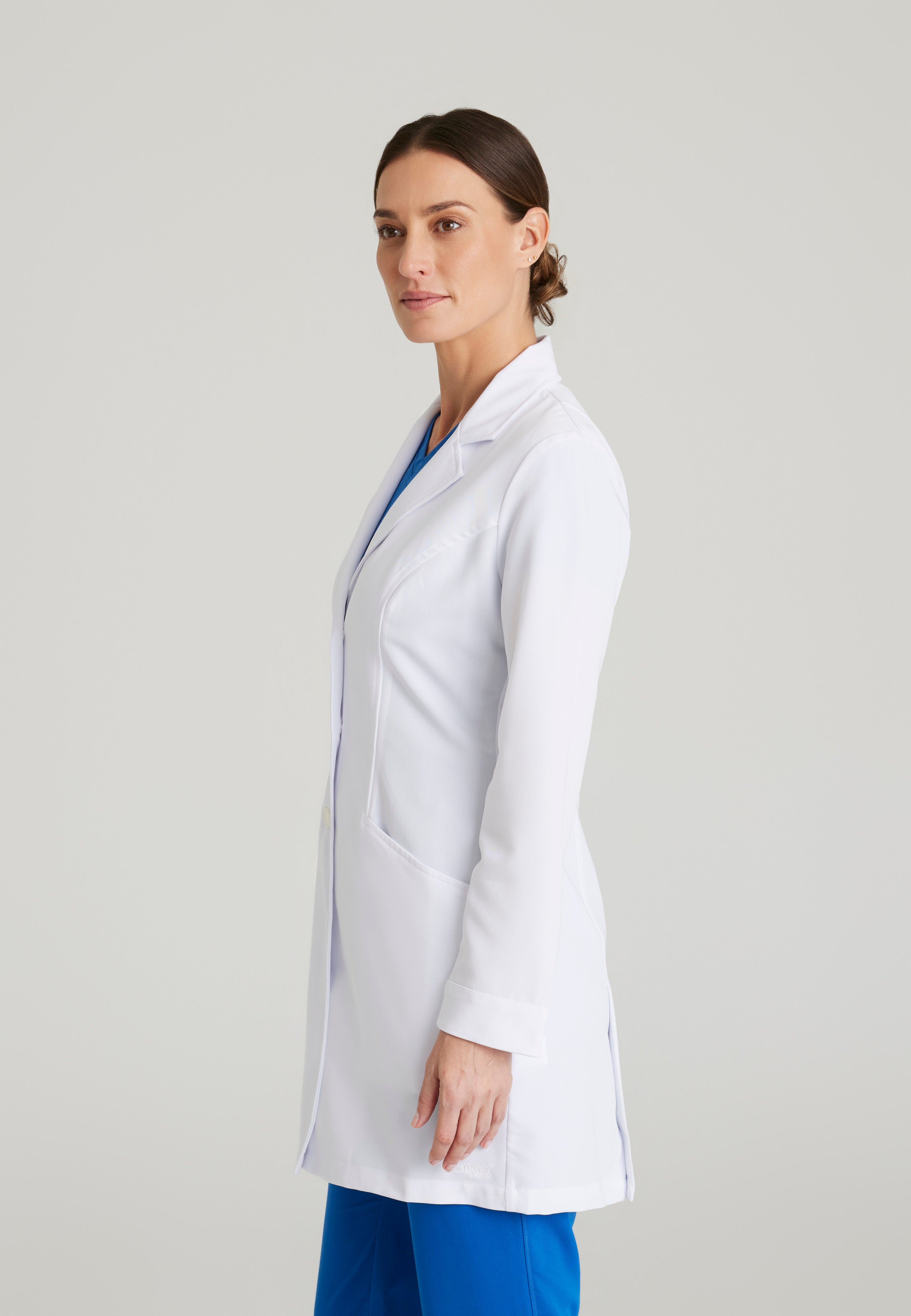Side View of the Eve 2-Pocket 34" Lab Coat in White from Grey's Anatomy™ by Barco Signature