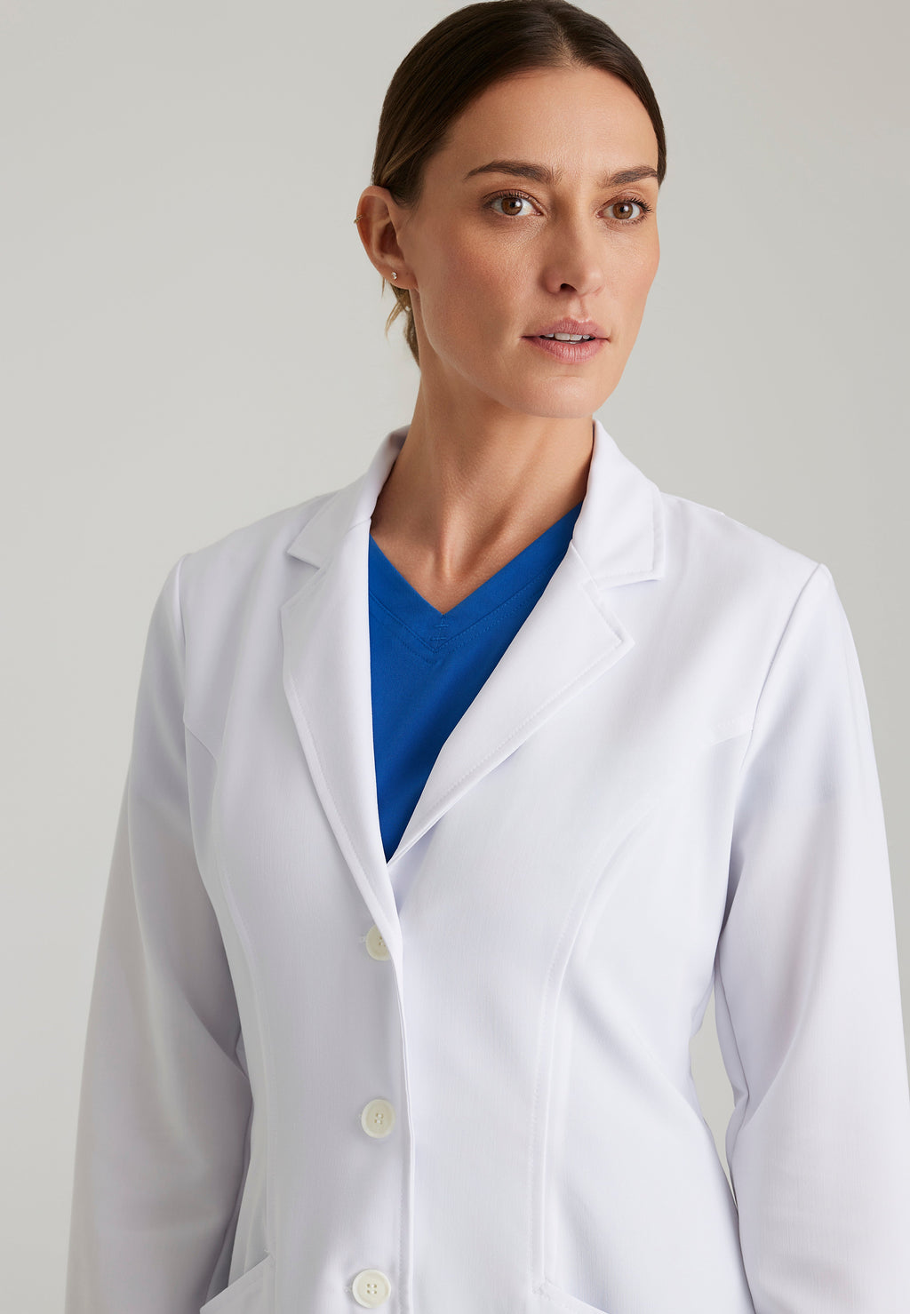 Detail Shot of the Eve 2-Pocket 34" Lab Coat in White from Grey's Anatomy™ by Barco Signature
