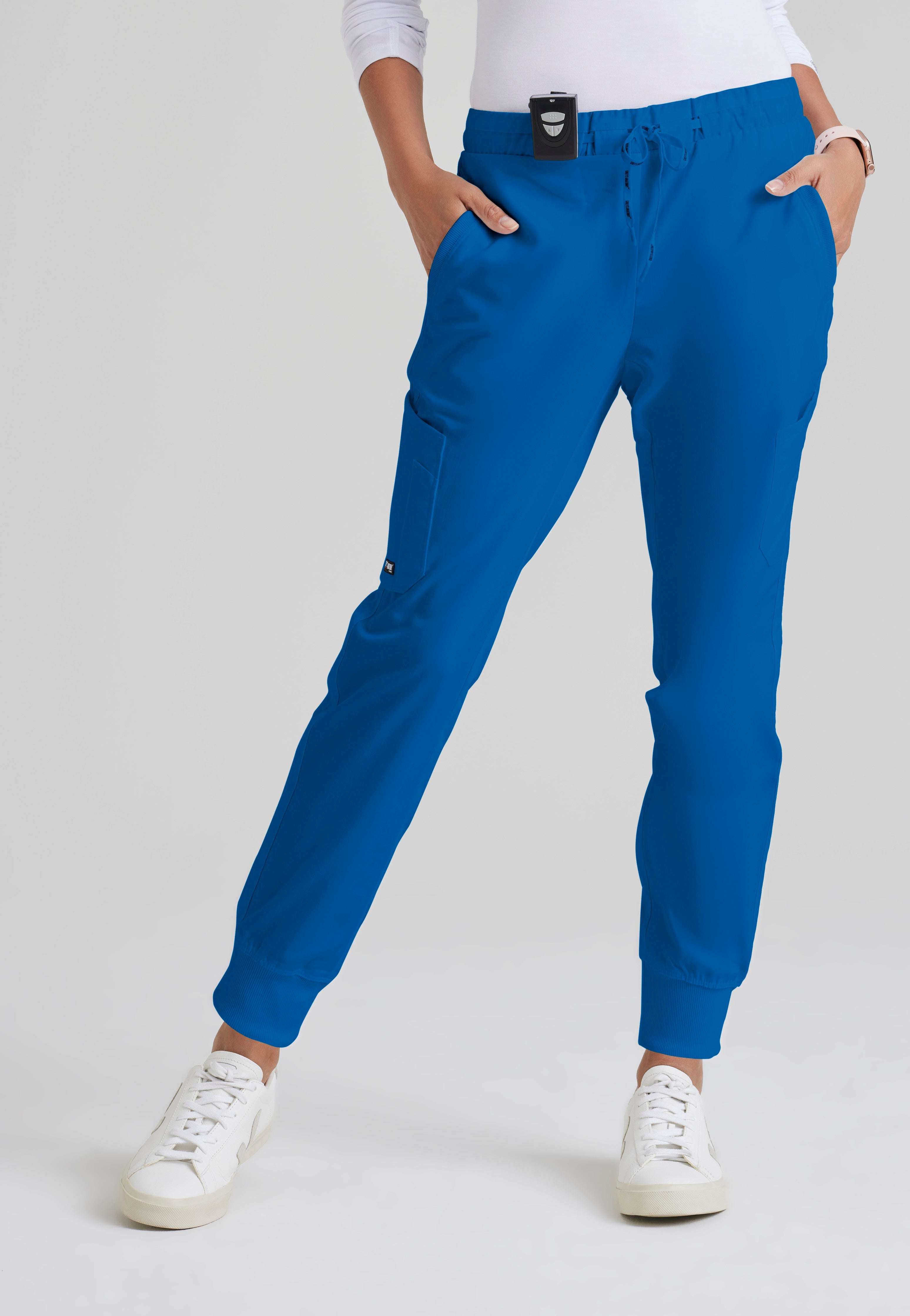 Front View of the Kira 5-Pocket Mid-Rise Jogger Scrub Pant in New Royal from Grey's Anatomy™ by Barco Classic