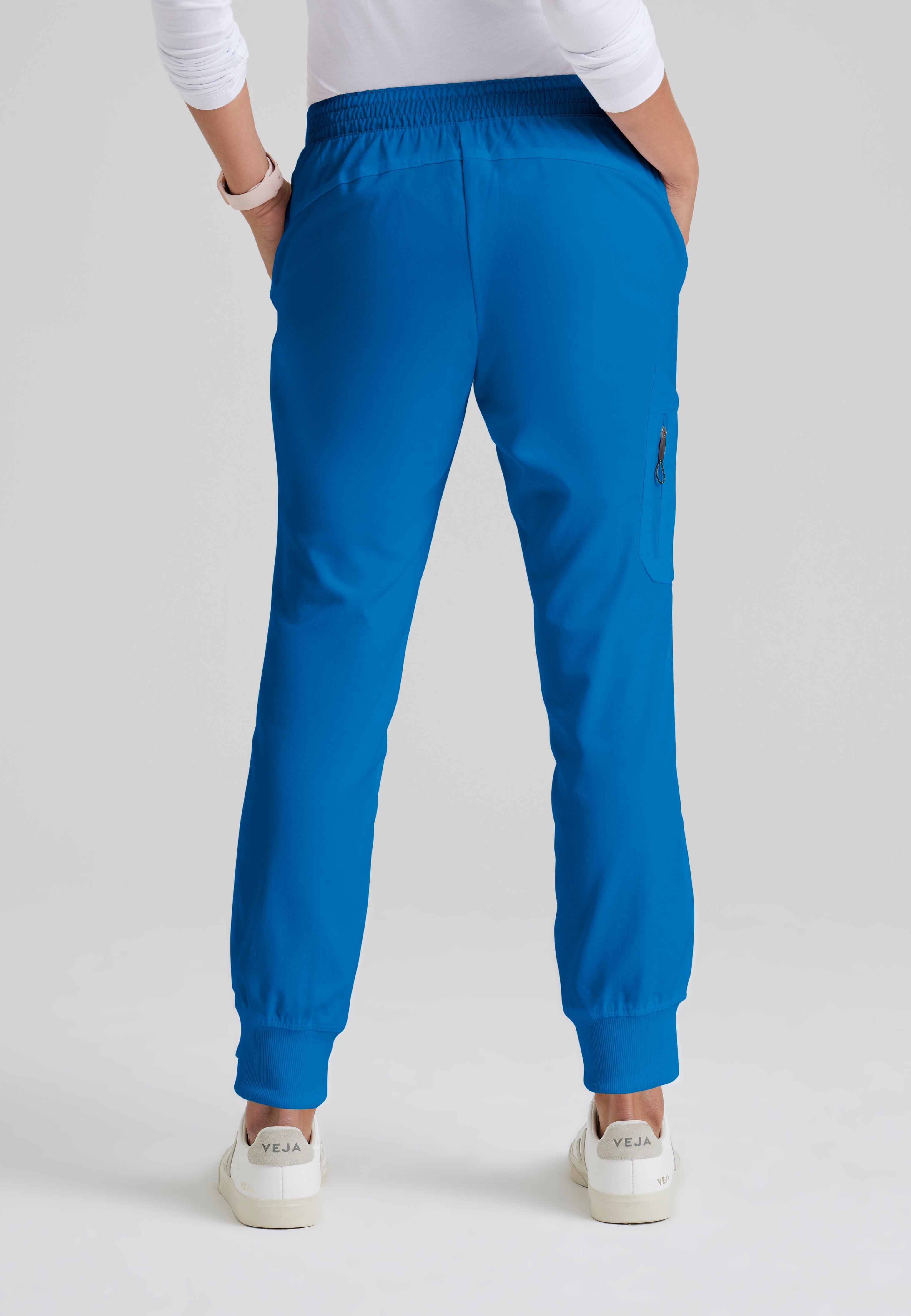 Back View of the Kira 5-Pocket Mid-Rise Jogger Scrub Pant in New Royal from Grey's Anatomy™ by Barco Classic