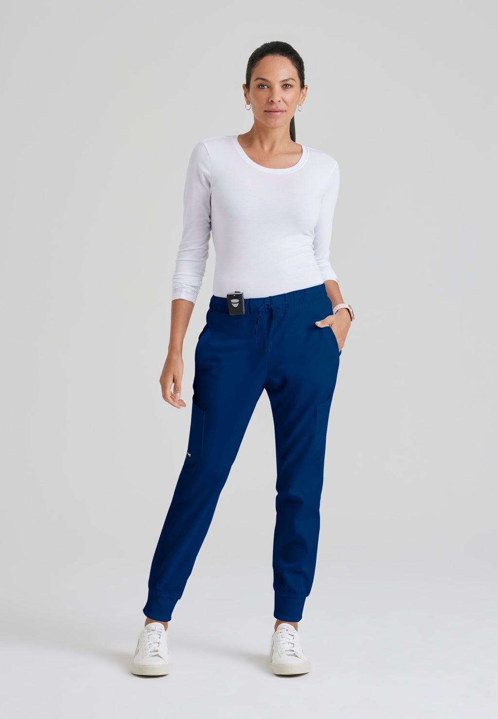 Full Body View of the Kira 5-Pocket Mid-Rise Jogger Scrub Pant in Indigo from Grey's Anatomy™ by Barco Classic