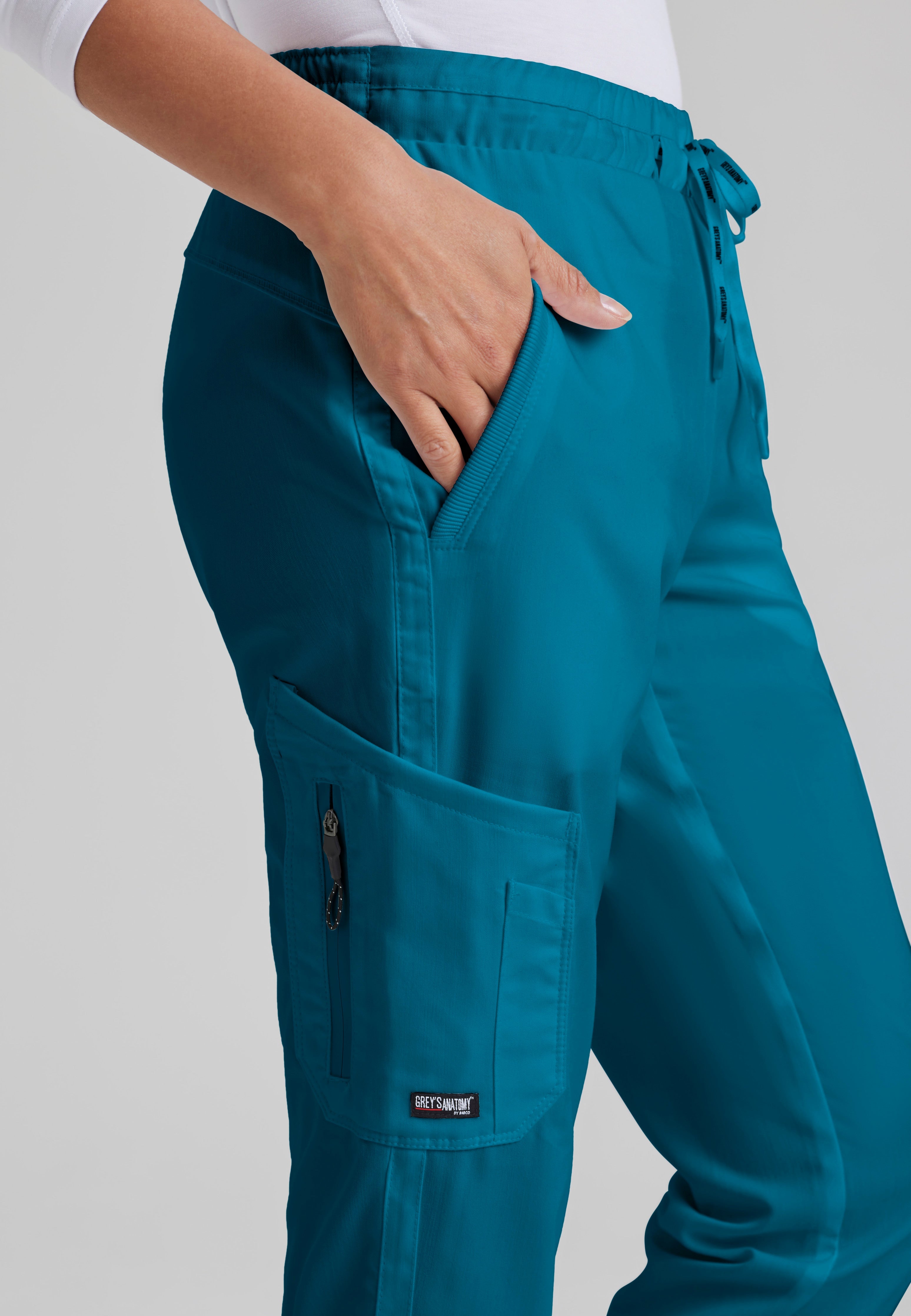 Detail Shot of the Kira 5-Pocket Mid-Rise Jogger Scrub Pant in Bahama from Grey's Anatomy™ by Barco Classic