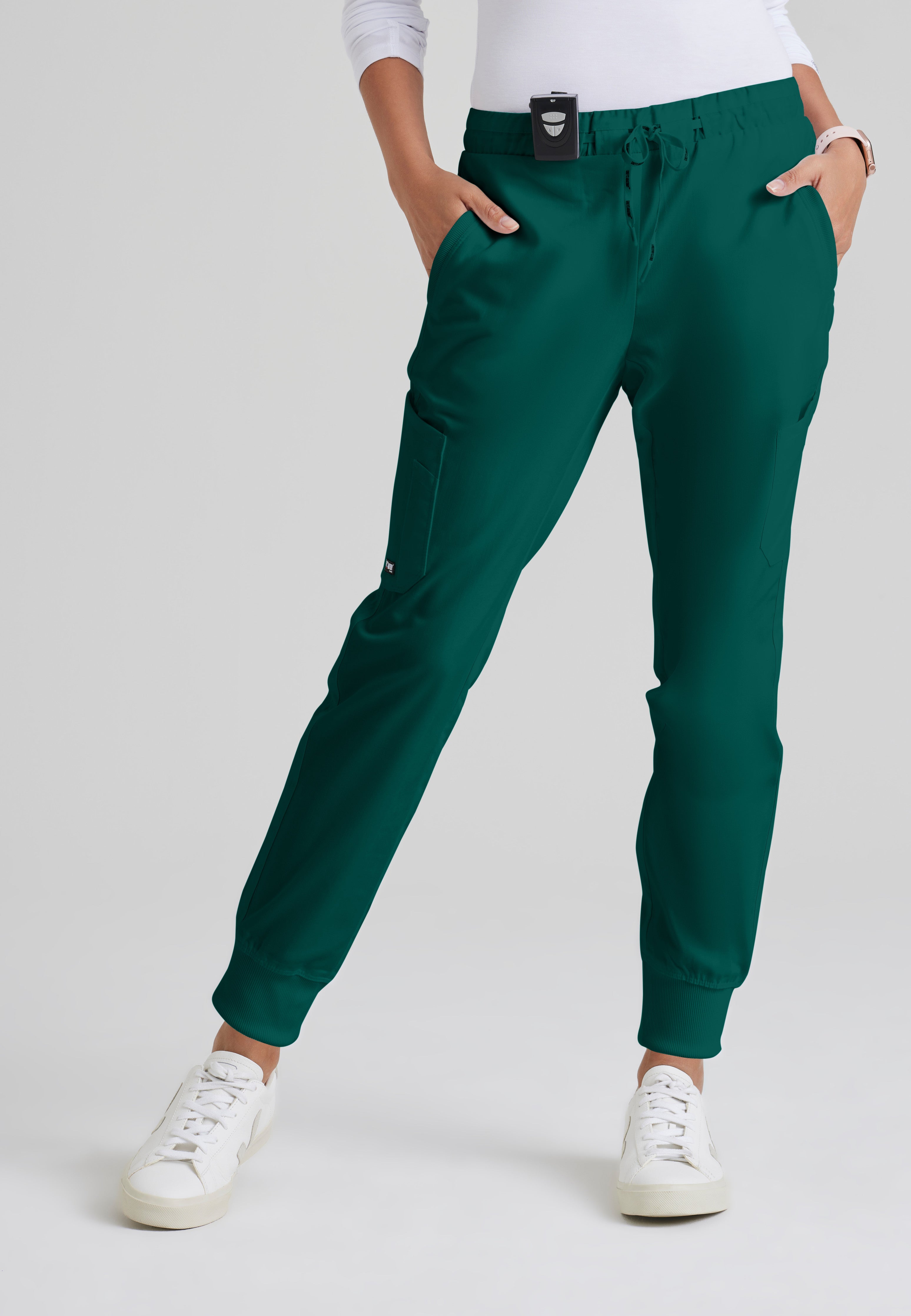 Front View of the Kira 5-Pocket Mid-Rise Jogger Scrub Pant in Hunter Green from Grey's Anatomy™ by Barco Classic